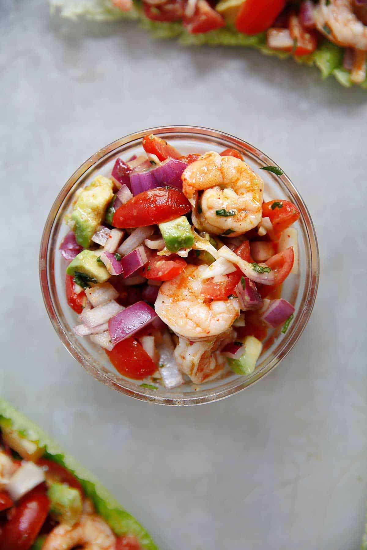 Shrimp avocado salad tossed salad in a mason jar