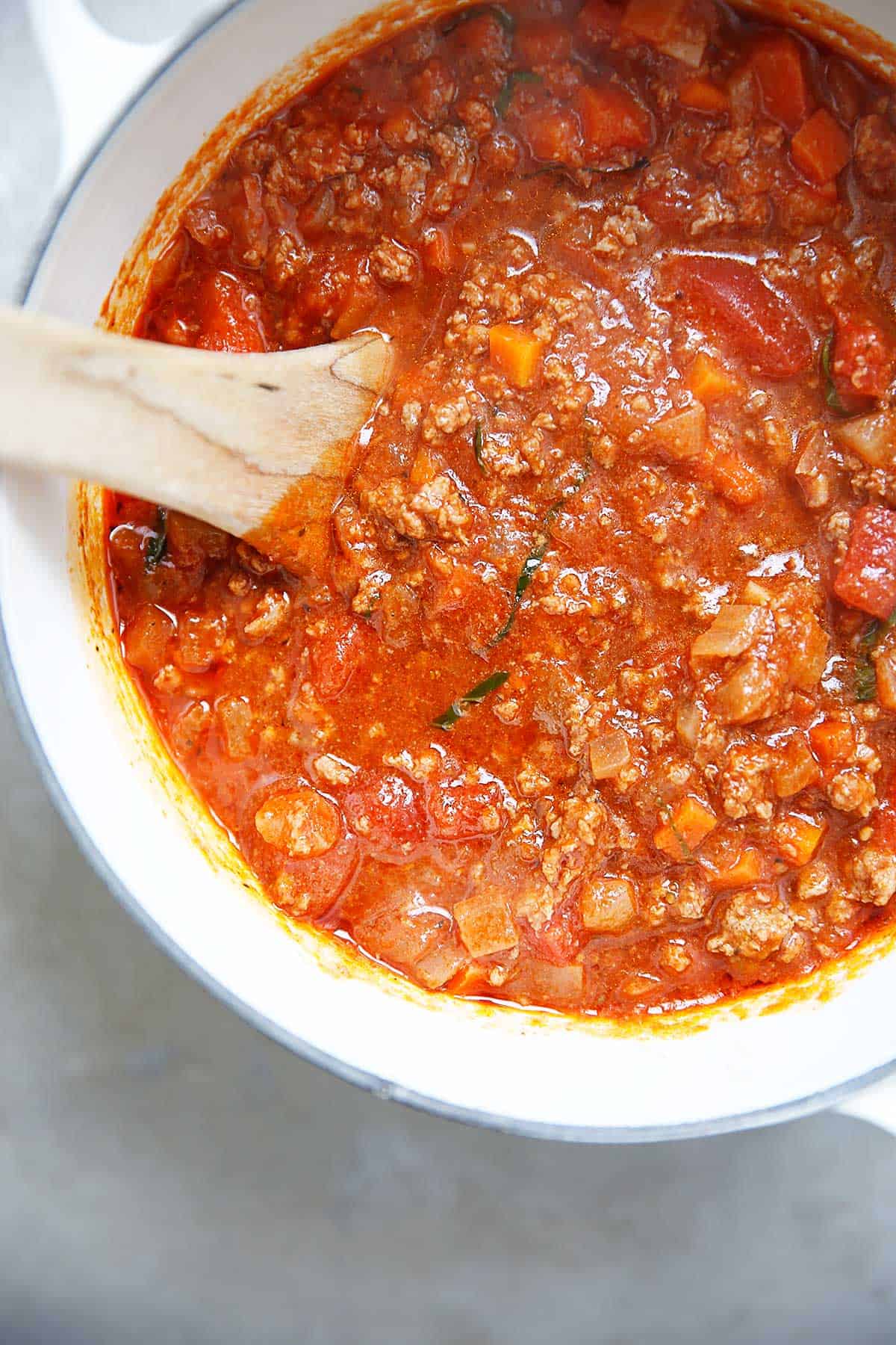 A homemade meat sauce in a pot.