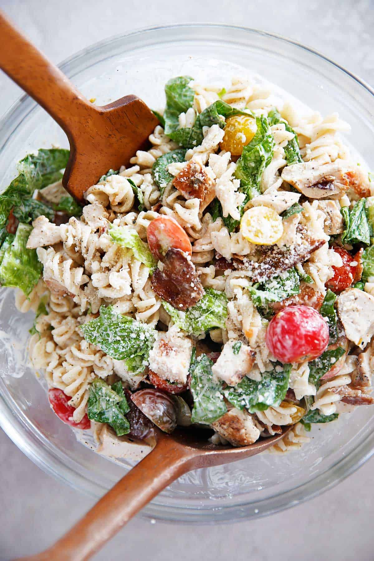 overhead of a bowl of chicken caesar pasta salad.