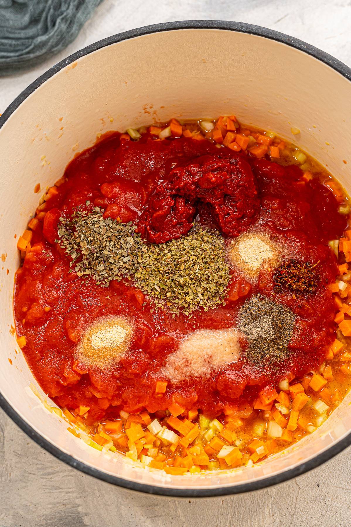 Spices in a pot to make Rustic Tomato Veggie Soup