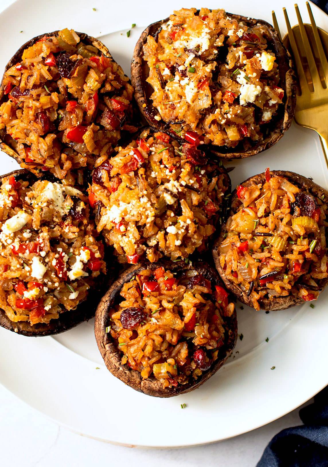 Meatless stuffed mushrooms for a holiday on a plate.