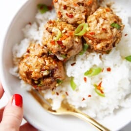 A bowl of turkey meatballs with rice.