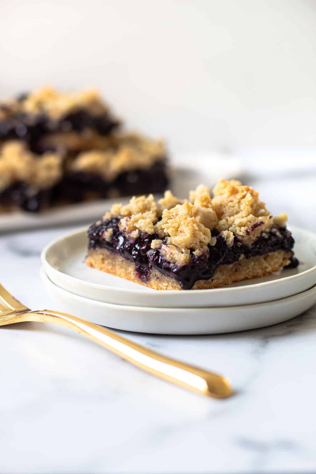 A healthy blueberry bar on a plate.