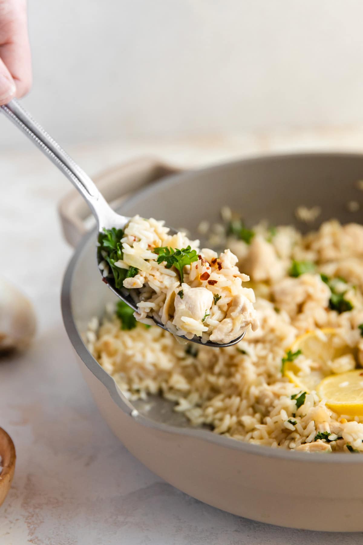 A spoonful of Lemon Chicken Rice Skillet