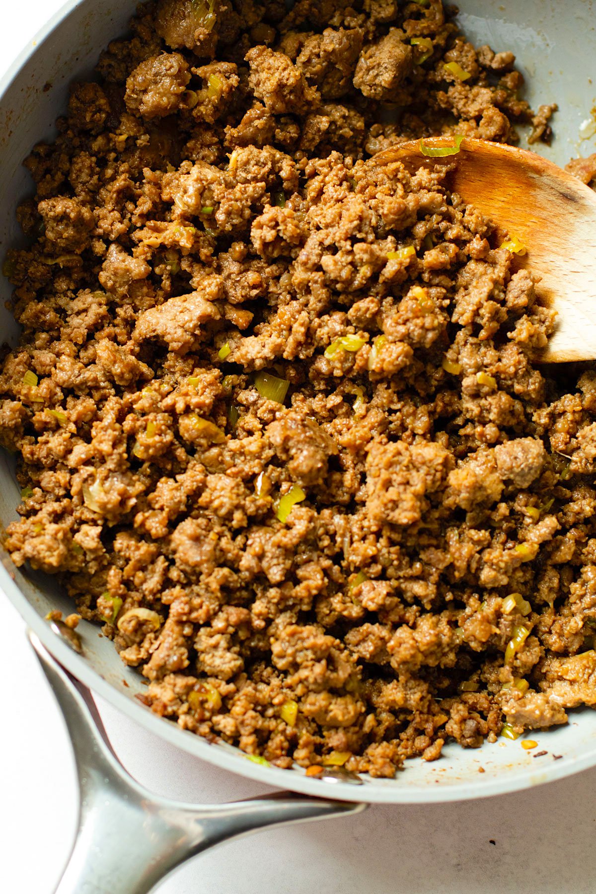 Asian style ground beef in a saute pan.