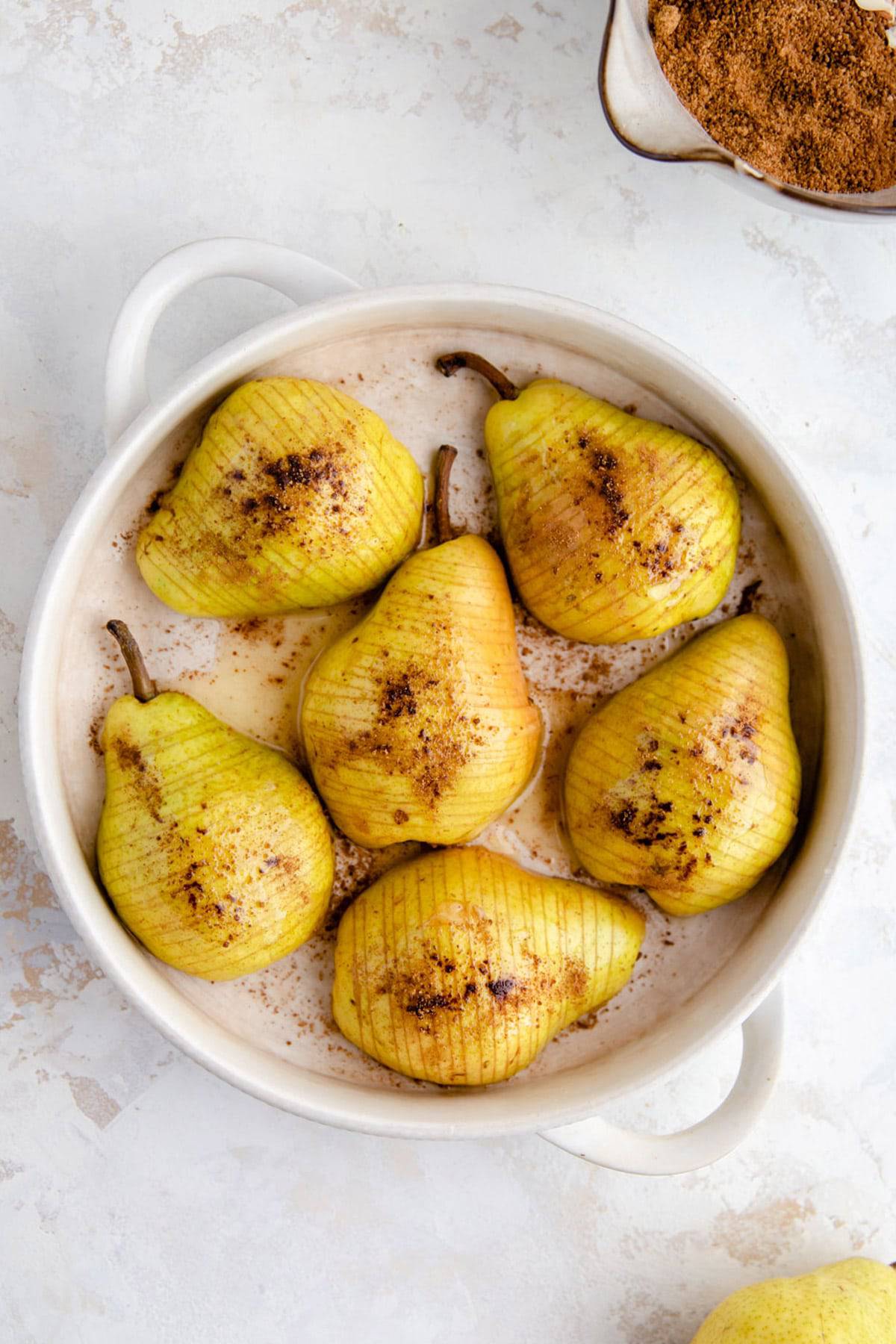 Baking hasselback pears.