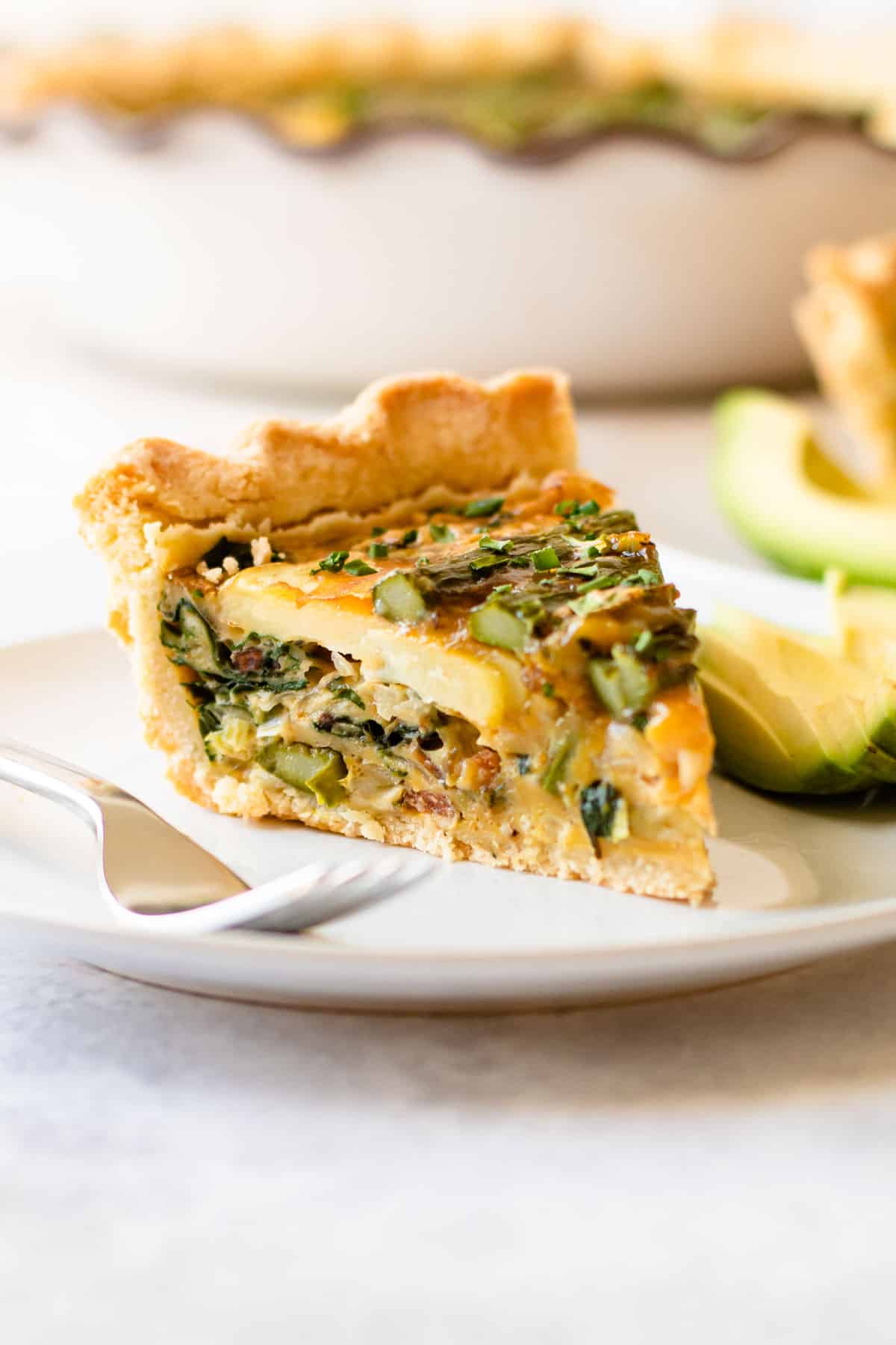 meal train idea: A slice of a gluten-free spring quiche.