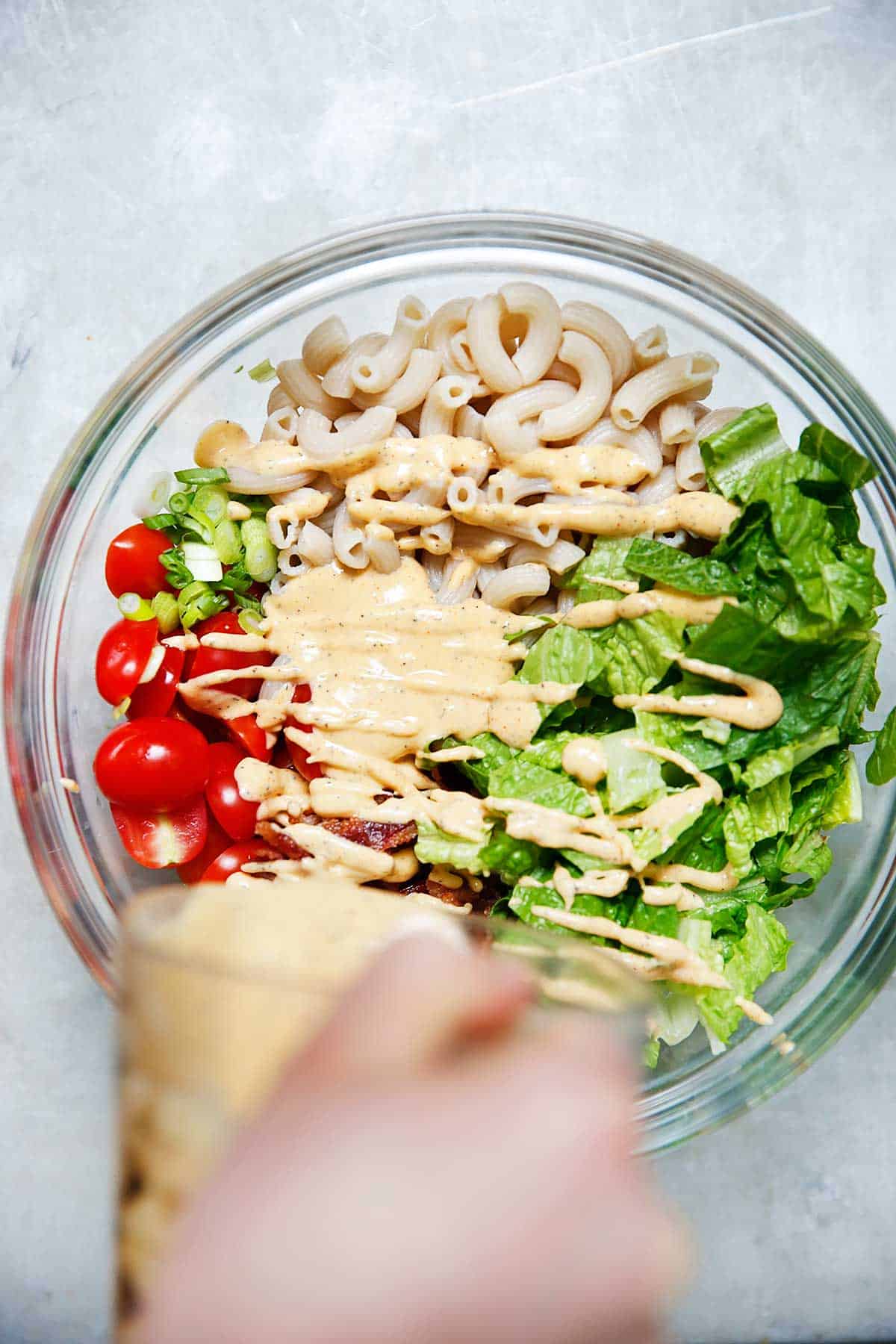 dressing the BLT Pasta Salad