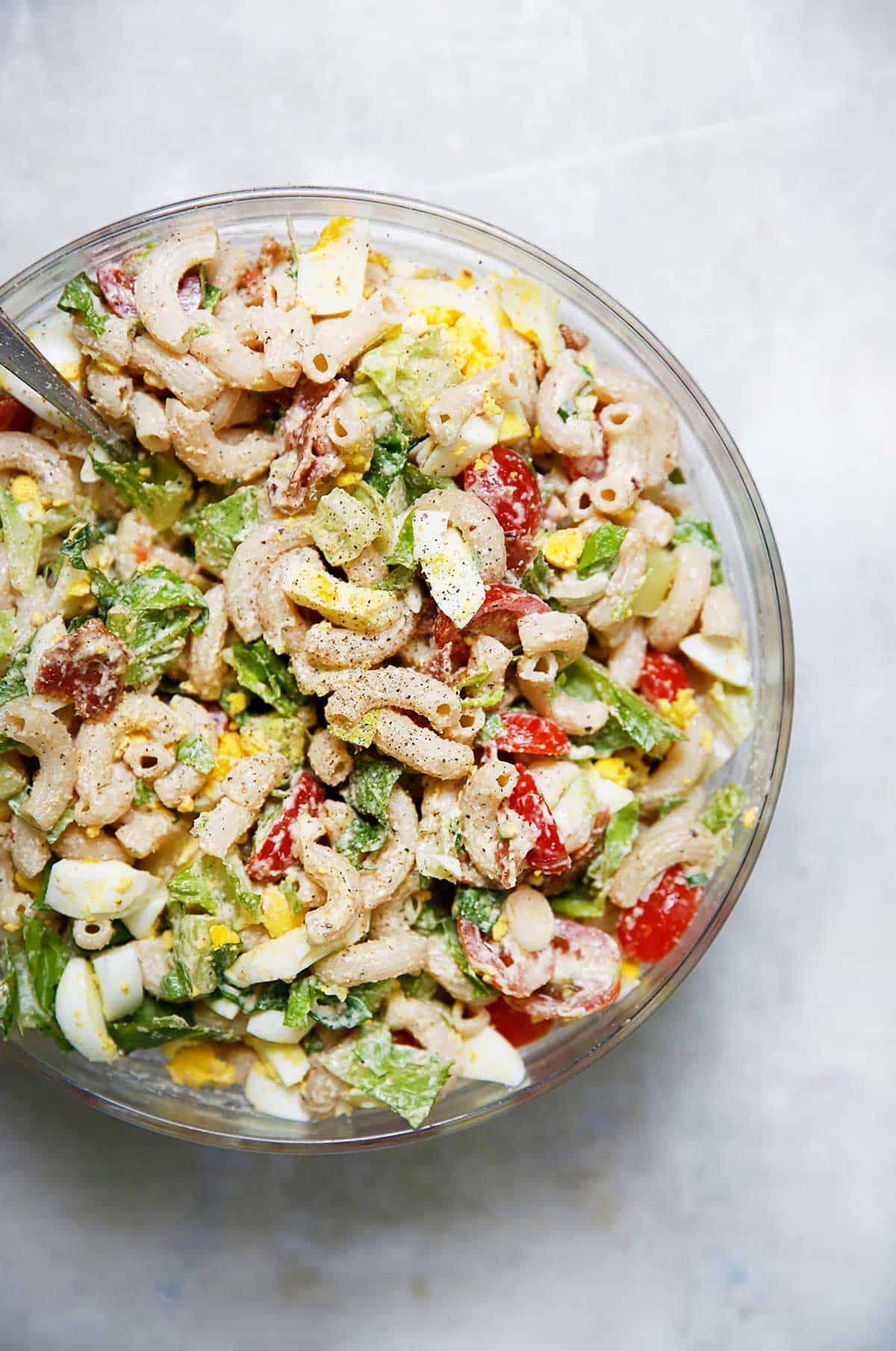 A serving bowl of BLT Pasta Salad.