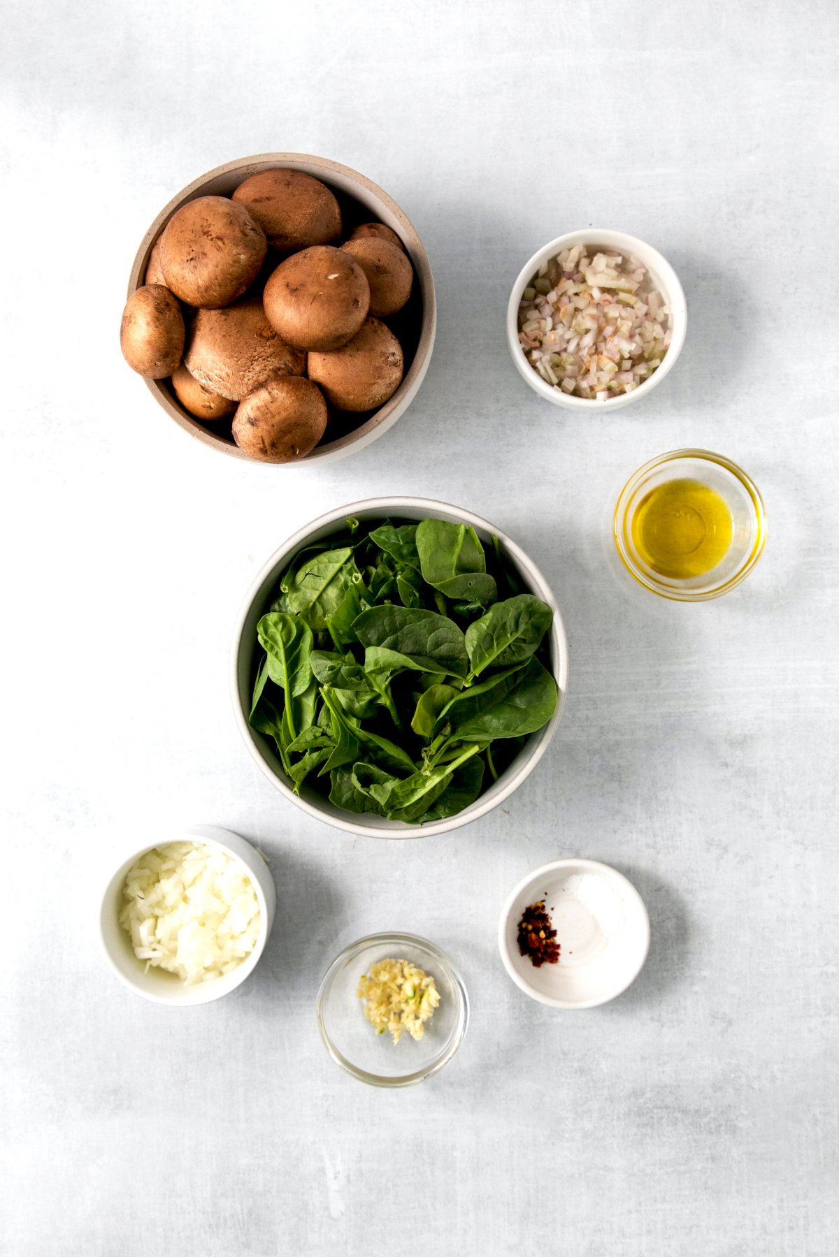 ingredients for spinach dip stuffed mushrooms.