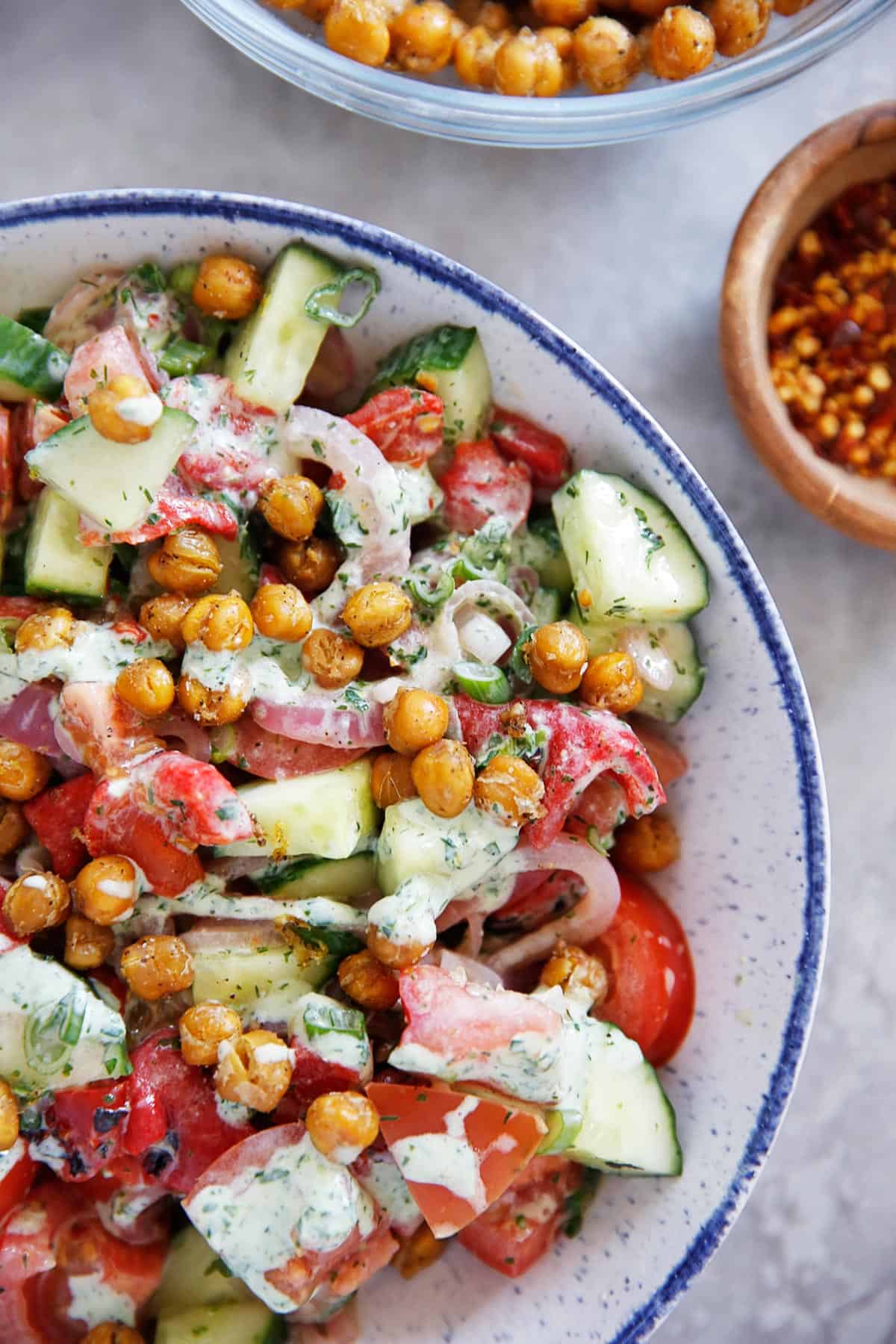 Tomato Cucumber Salad with Crispy Cumin Chickpeas & Green Yogurt Dressing