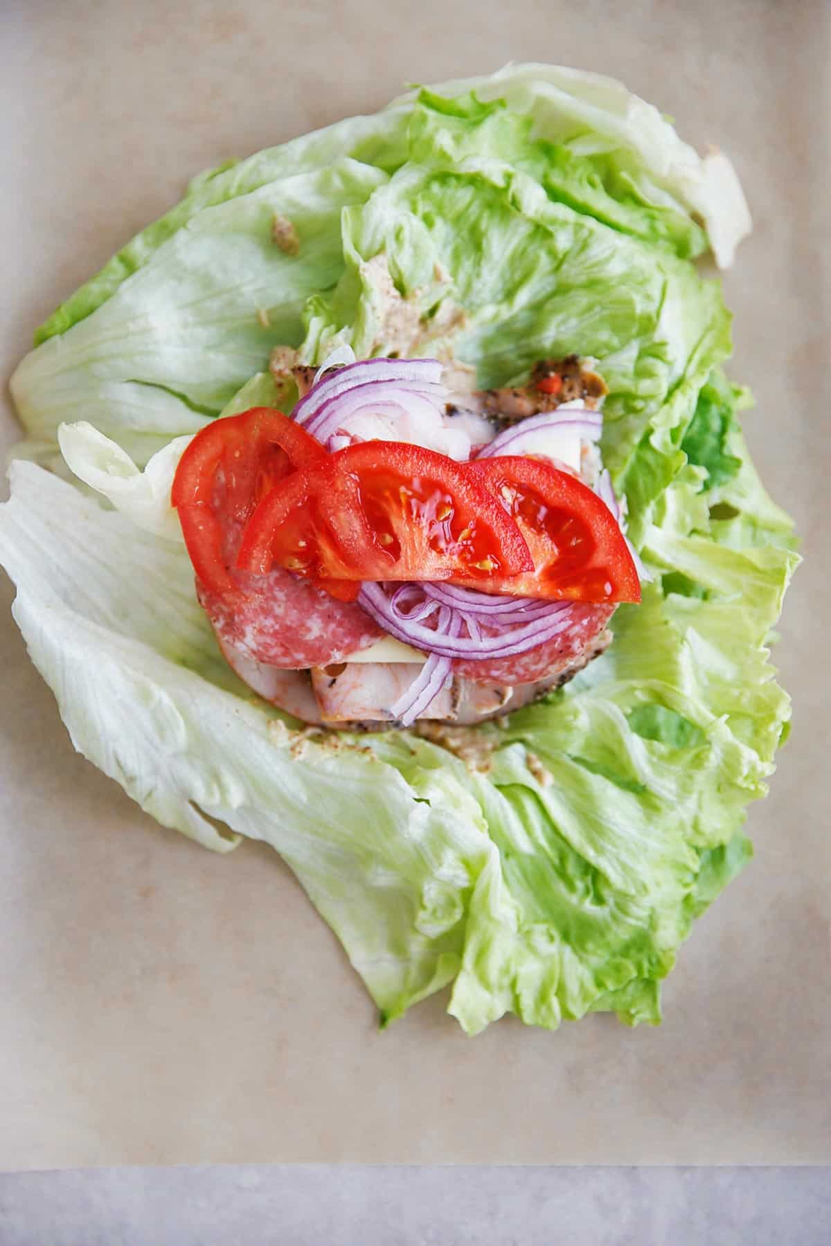 Lettuce wrap sandwich being made