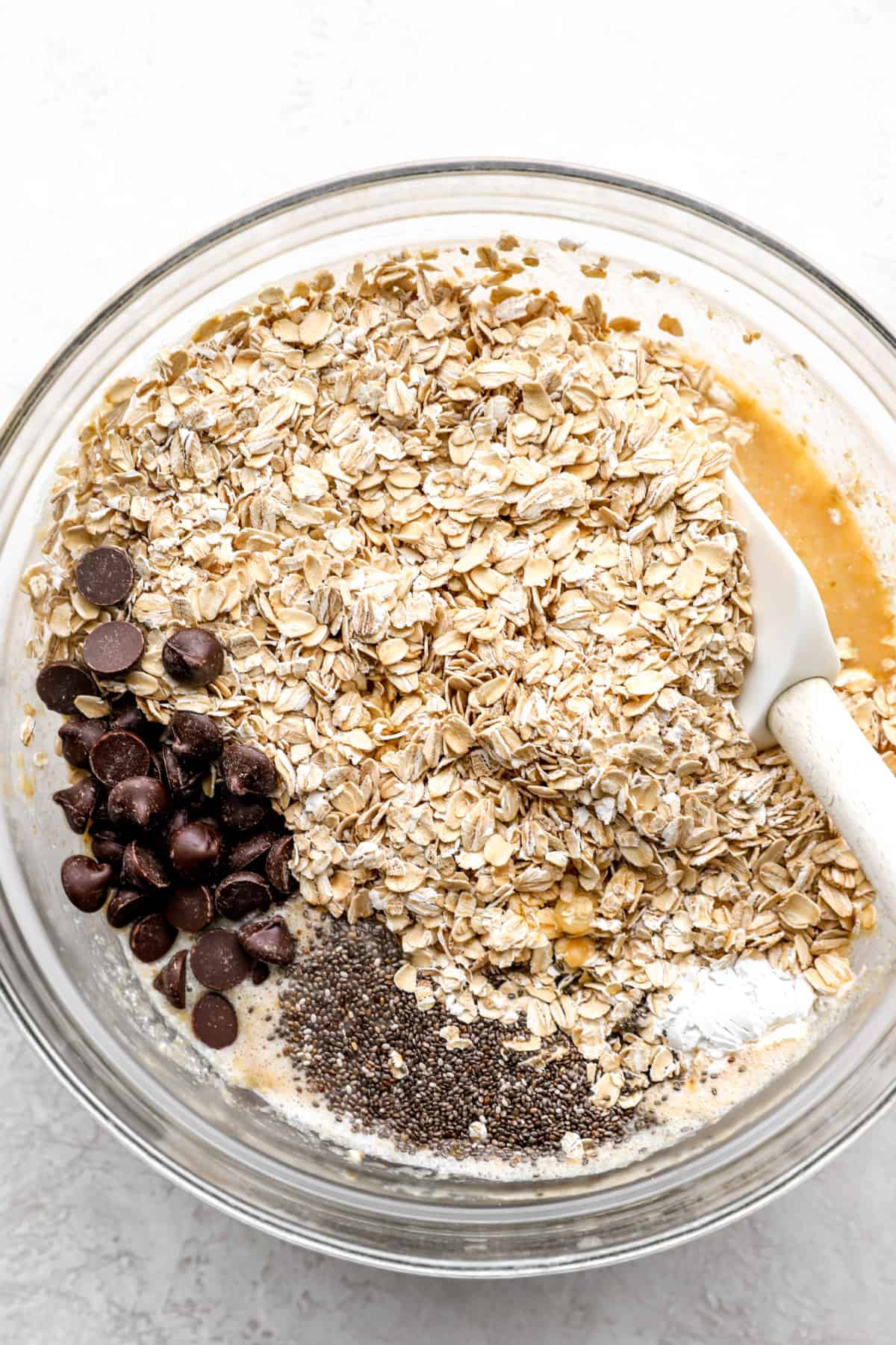 baked oatmeal ingredients unmixed in a bowl.