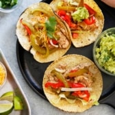 Three Sheet Pan Chicken Fajitas tacos.