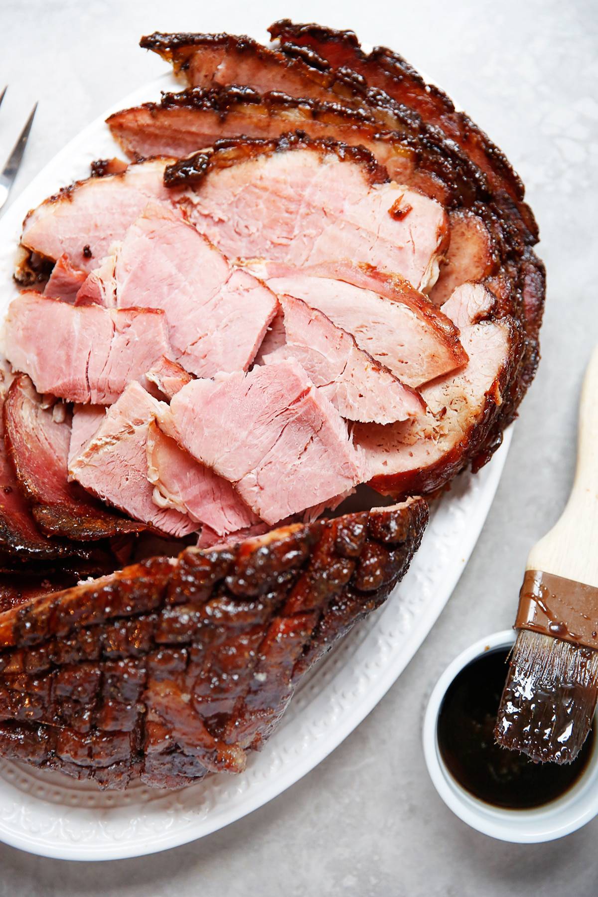 A simple baked ham recipe sliced and ready to eat