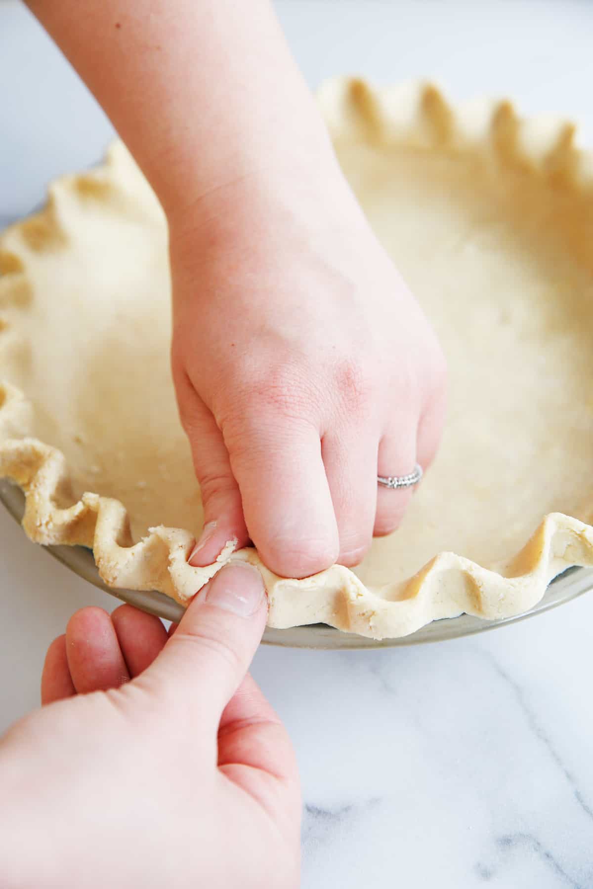 Oat flour pie crust in pie tin