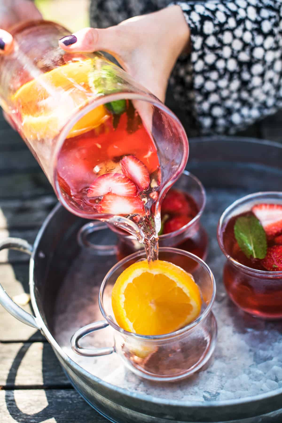 Pouring rose sangria easy