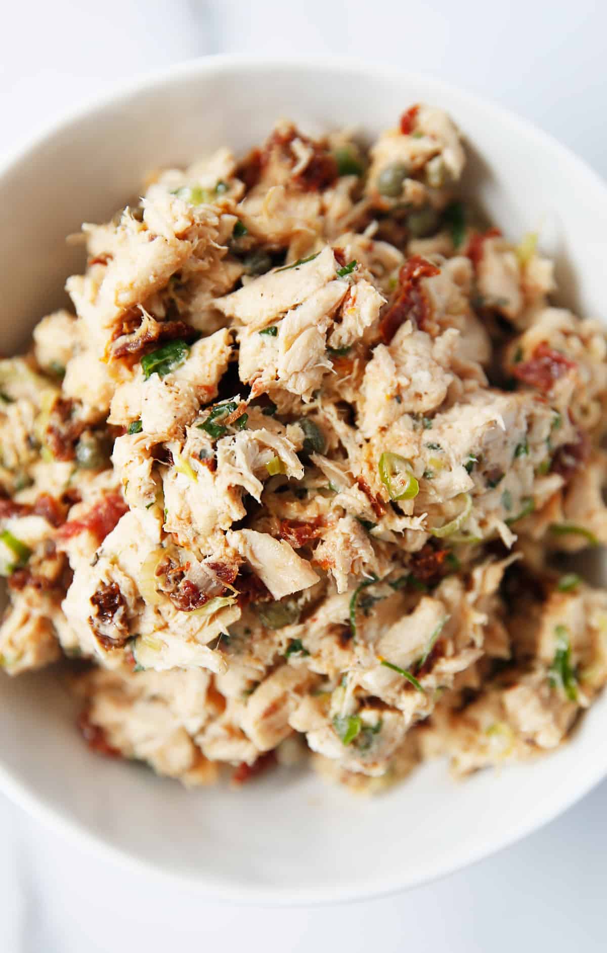 Chicken salad sun dried tomatoes in a bowl