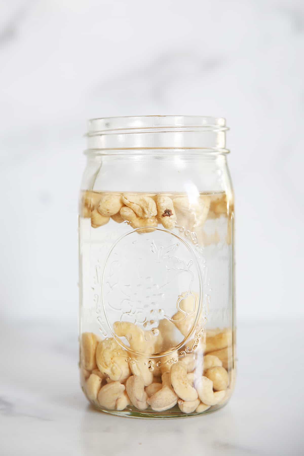 soaking cashews in a jar