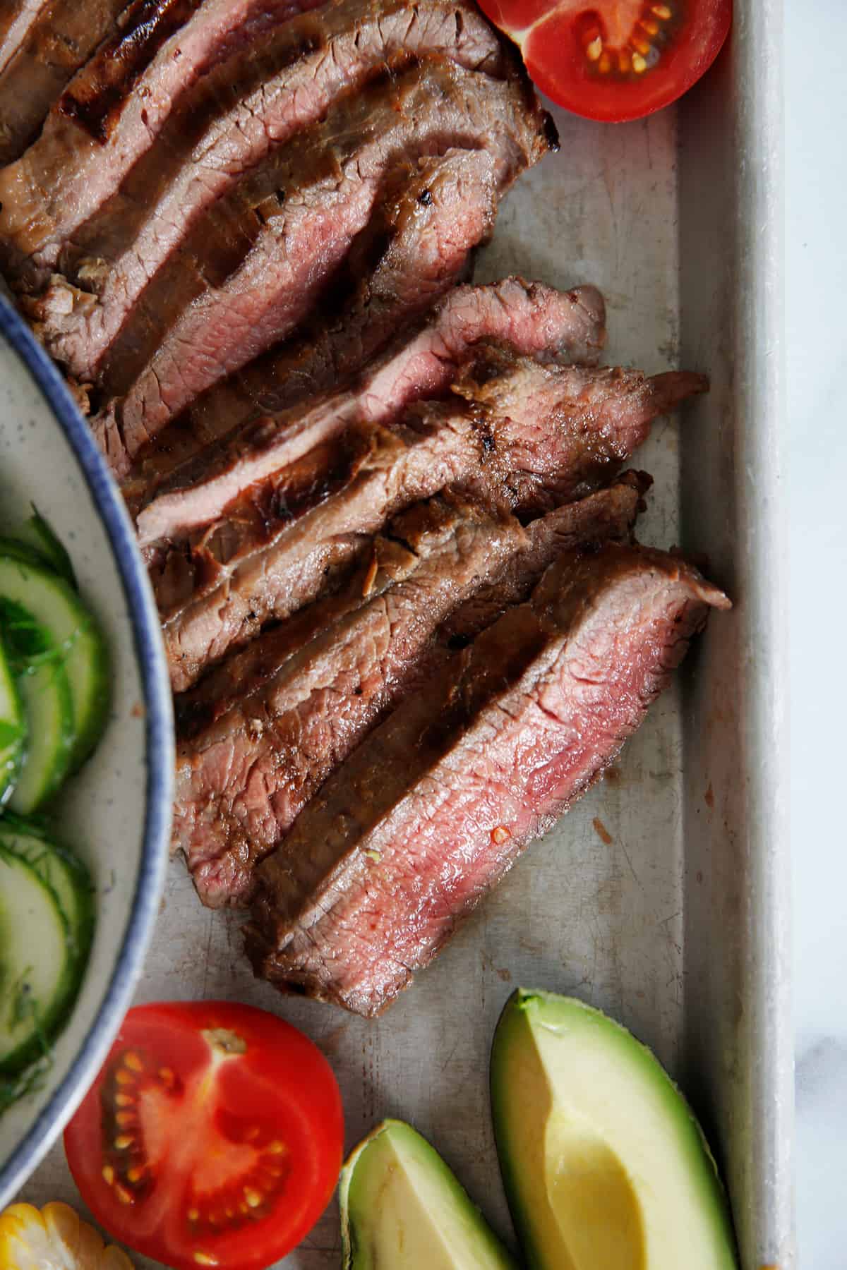grilled flank steak cut against the grain