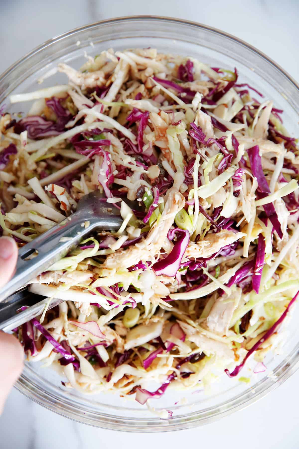 tossing finished sweet slaw recipe
