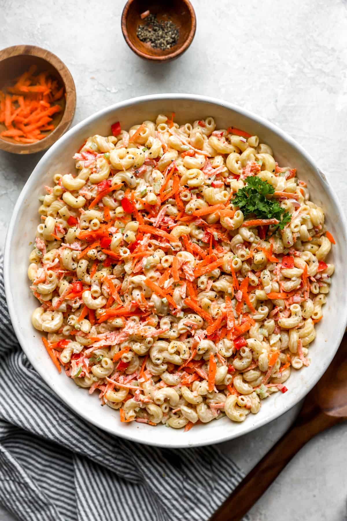 overhead of a large bowl filled with macaroni pasta salad. 