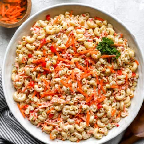 overhead of a large bowl filled with macaroni pasta salad.