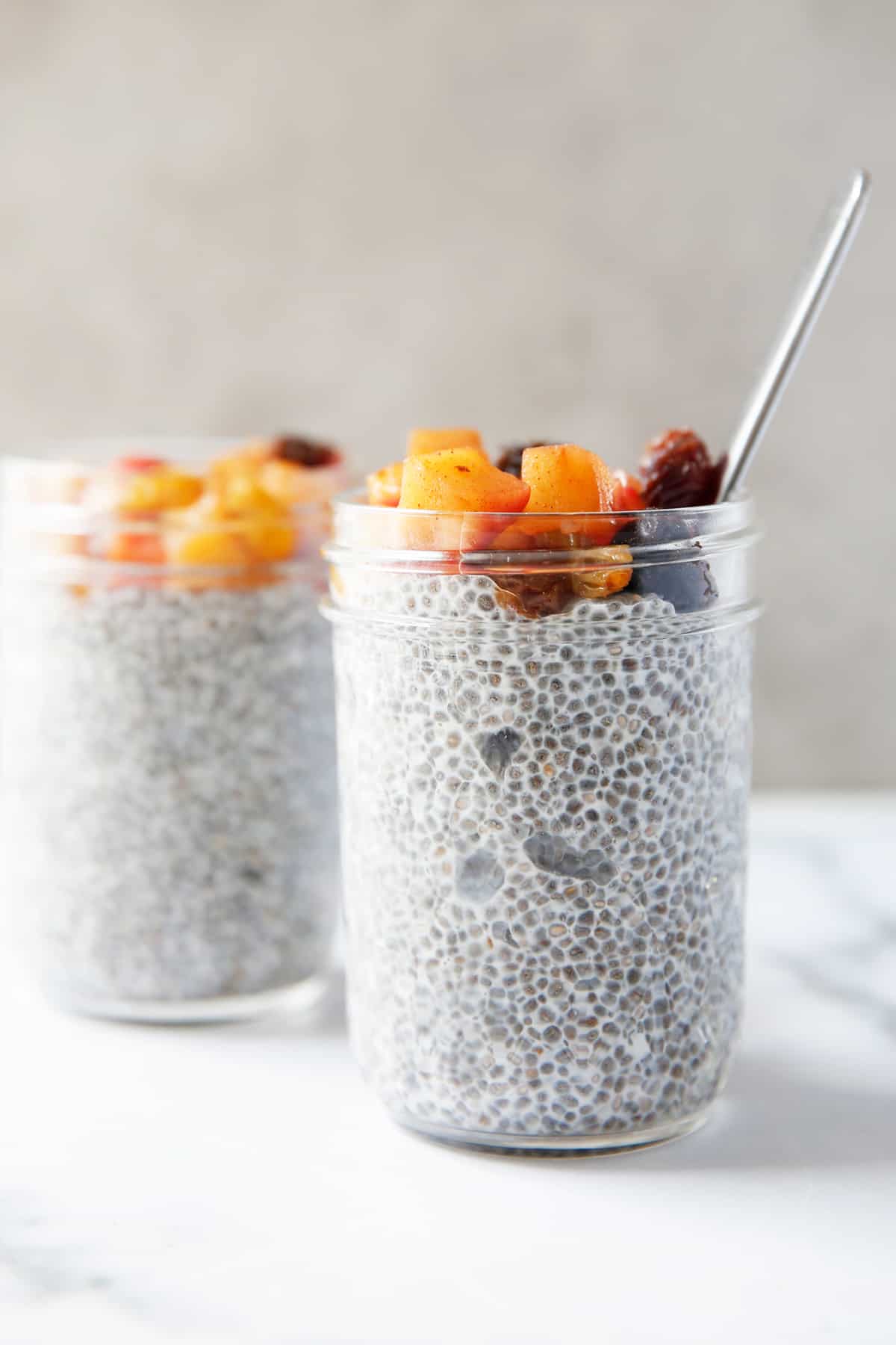 Two jars of chia seed pudding.