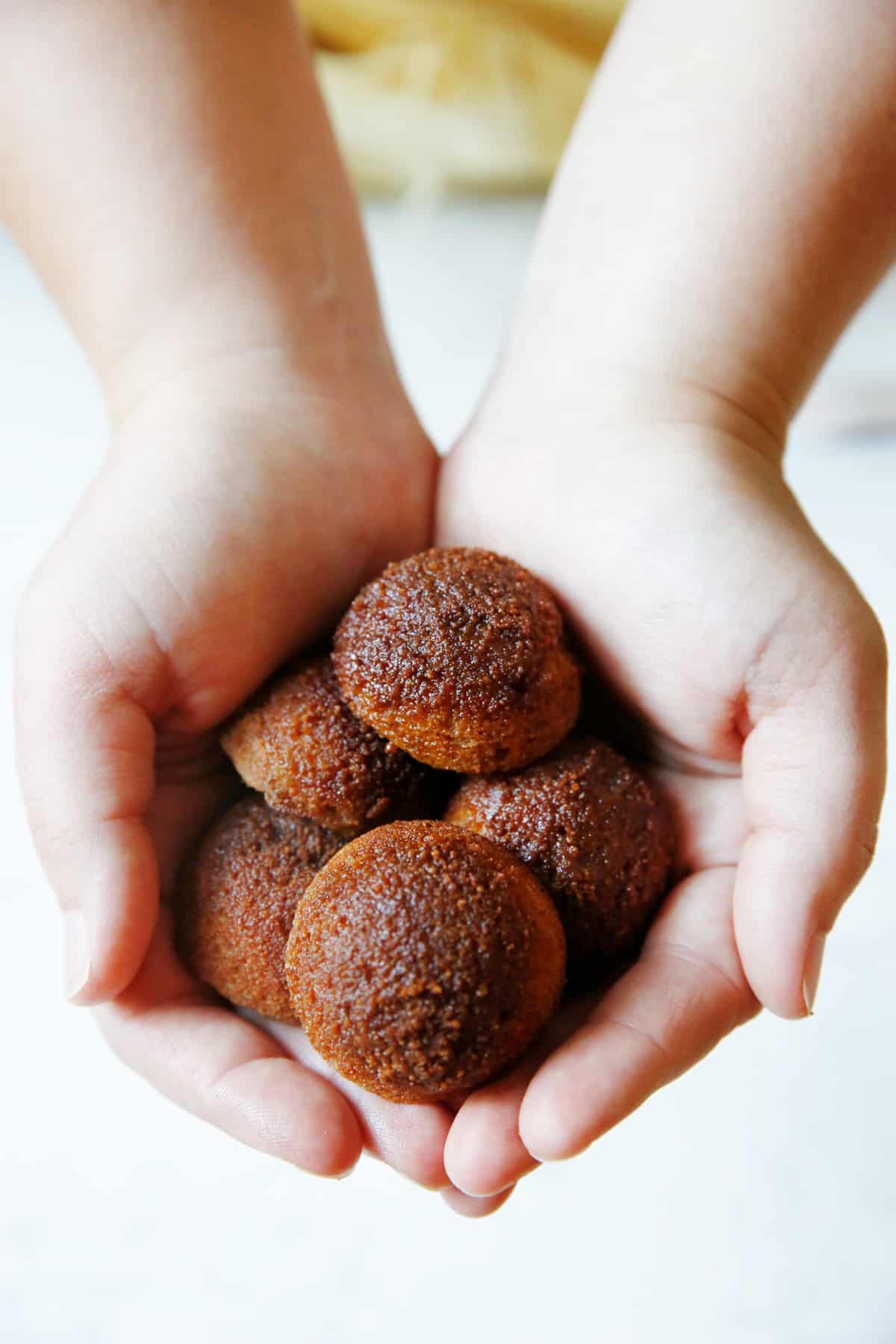 A handful of Apple Cider Donut Holes
