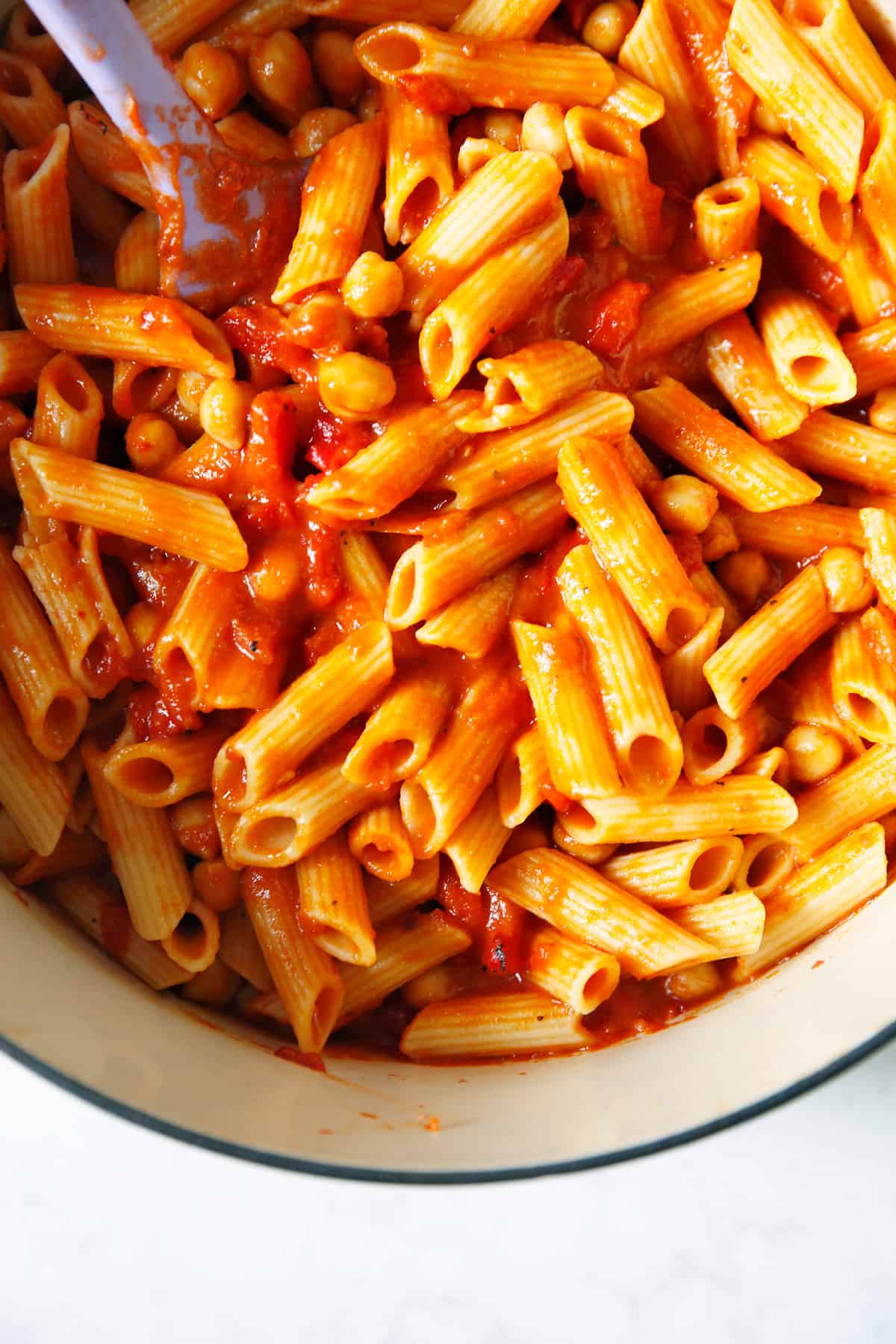 Pasta with roasted red peppers in a pot