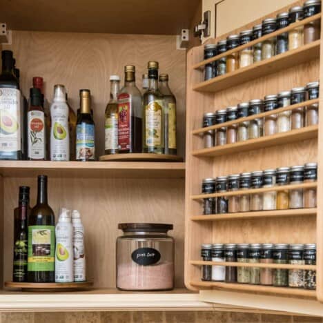 salt, spices, oils in cabinet