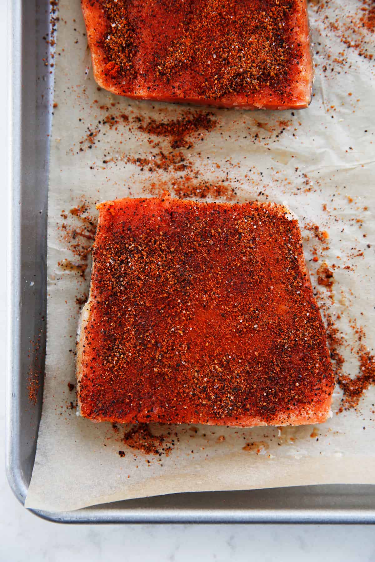 Chili powder rubbed on salmon.