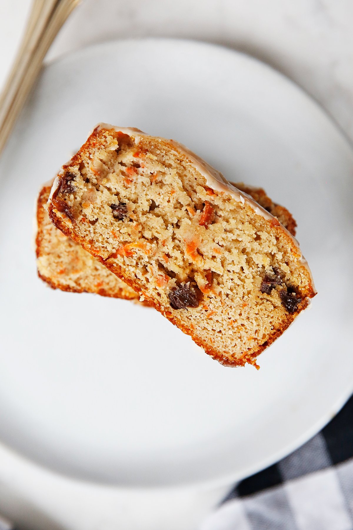 A slice of carrot bread on a plate.