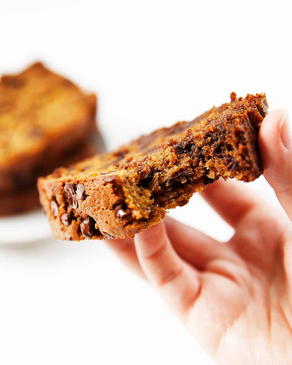 A slice of gluten-free chocolate chip banana bread.