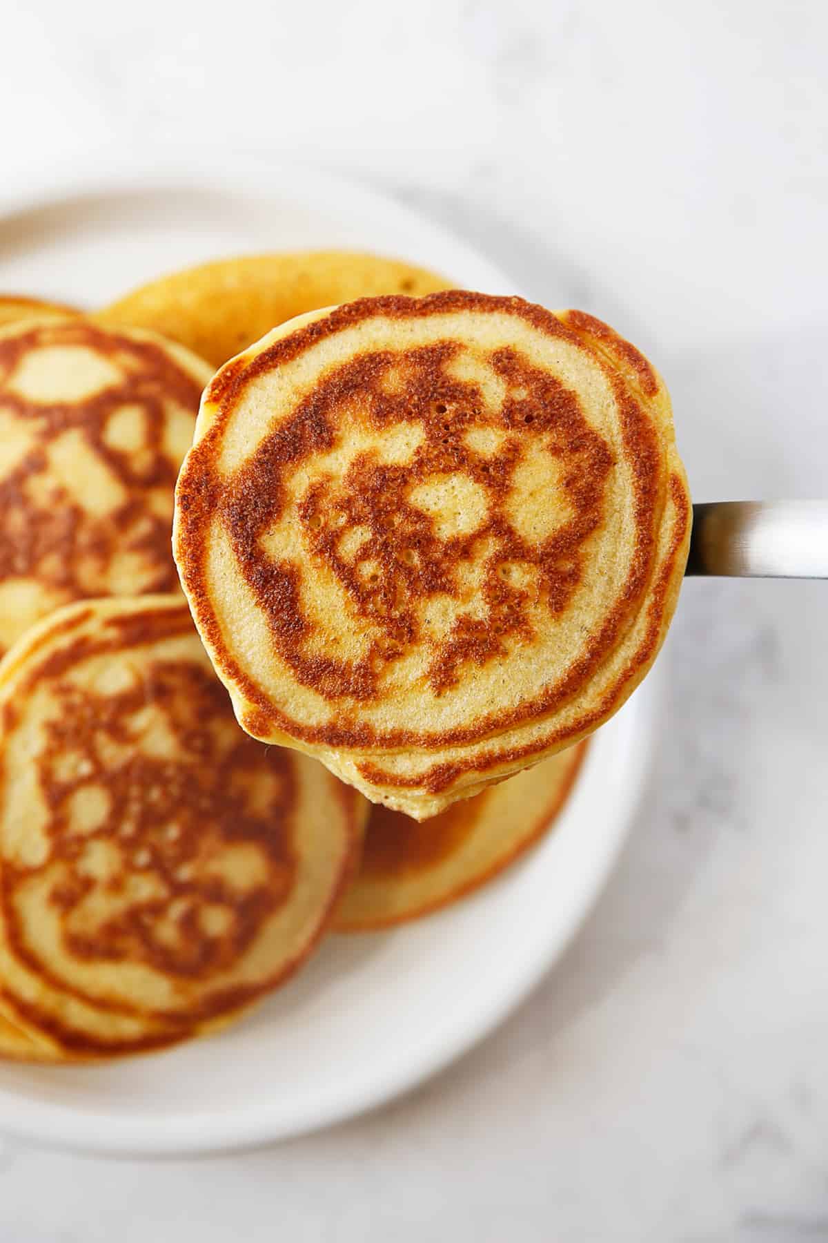 Almond flour pancakes on a plate.