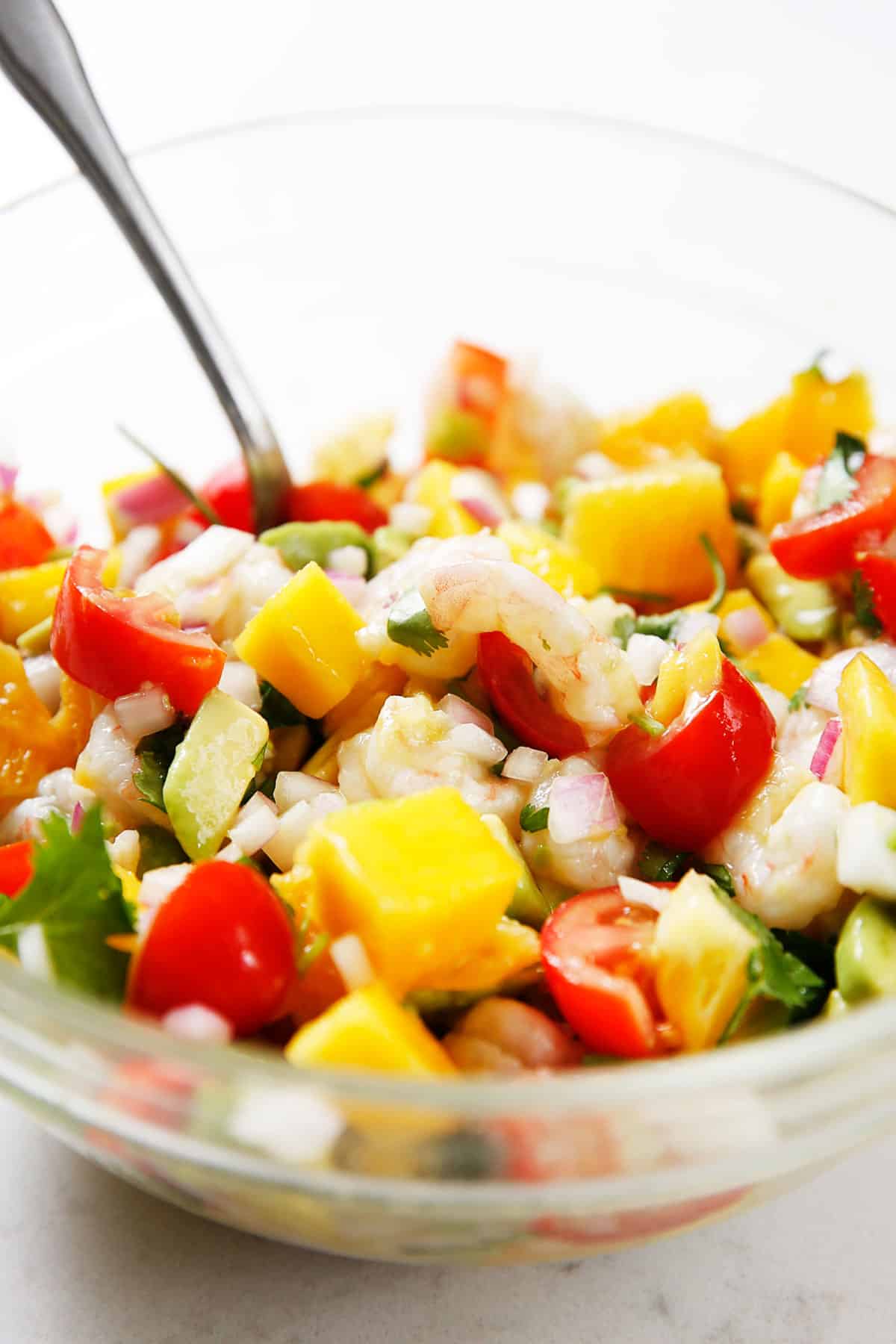 A bowl of mango shrimp ceviche.