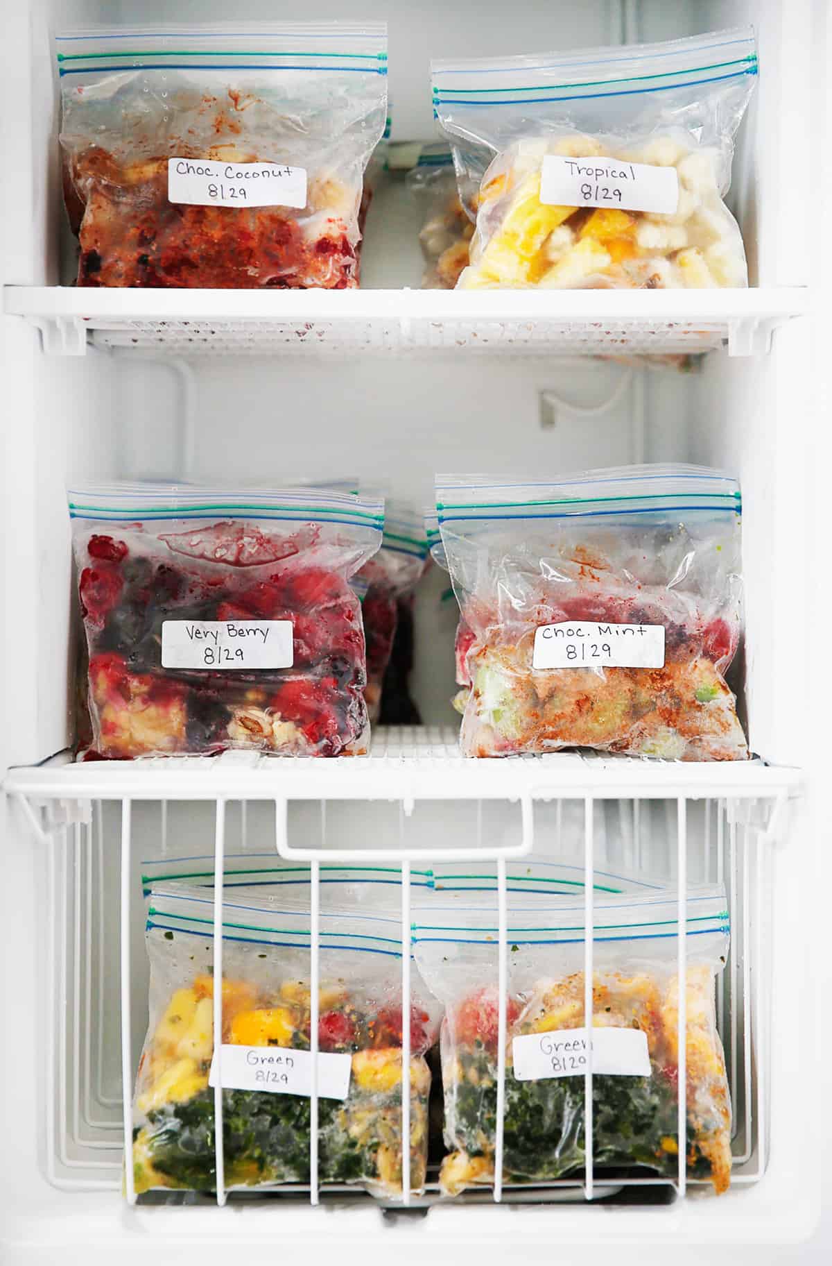 A freezer full of smoothie packs.
