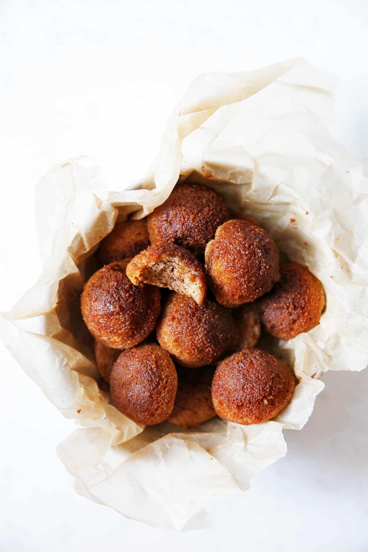 A basket of gluten-free apple cider donuts.