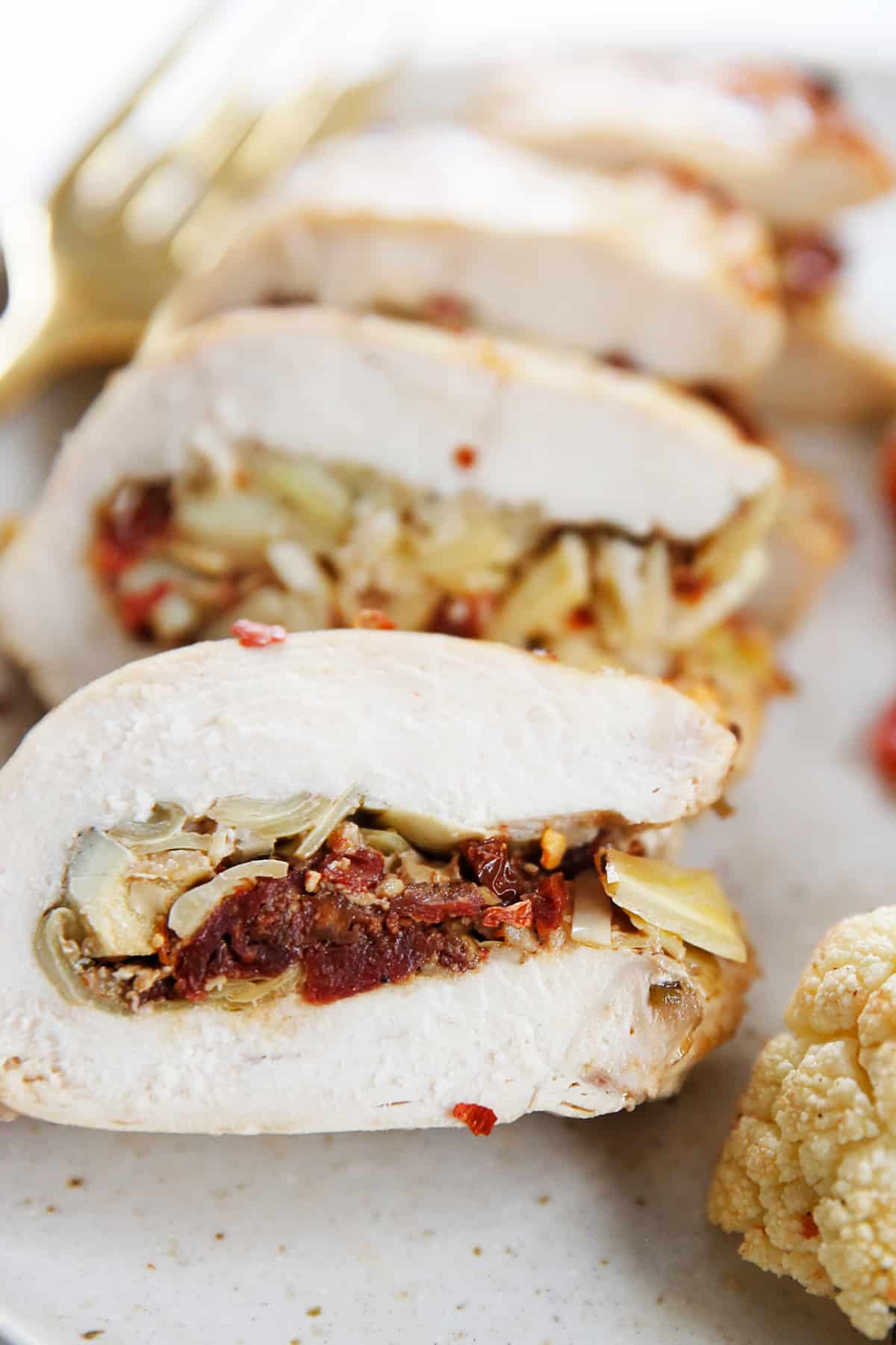 SUN-DRIED TOMATO AND ARTICHOKE STUFFED CHICKEN