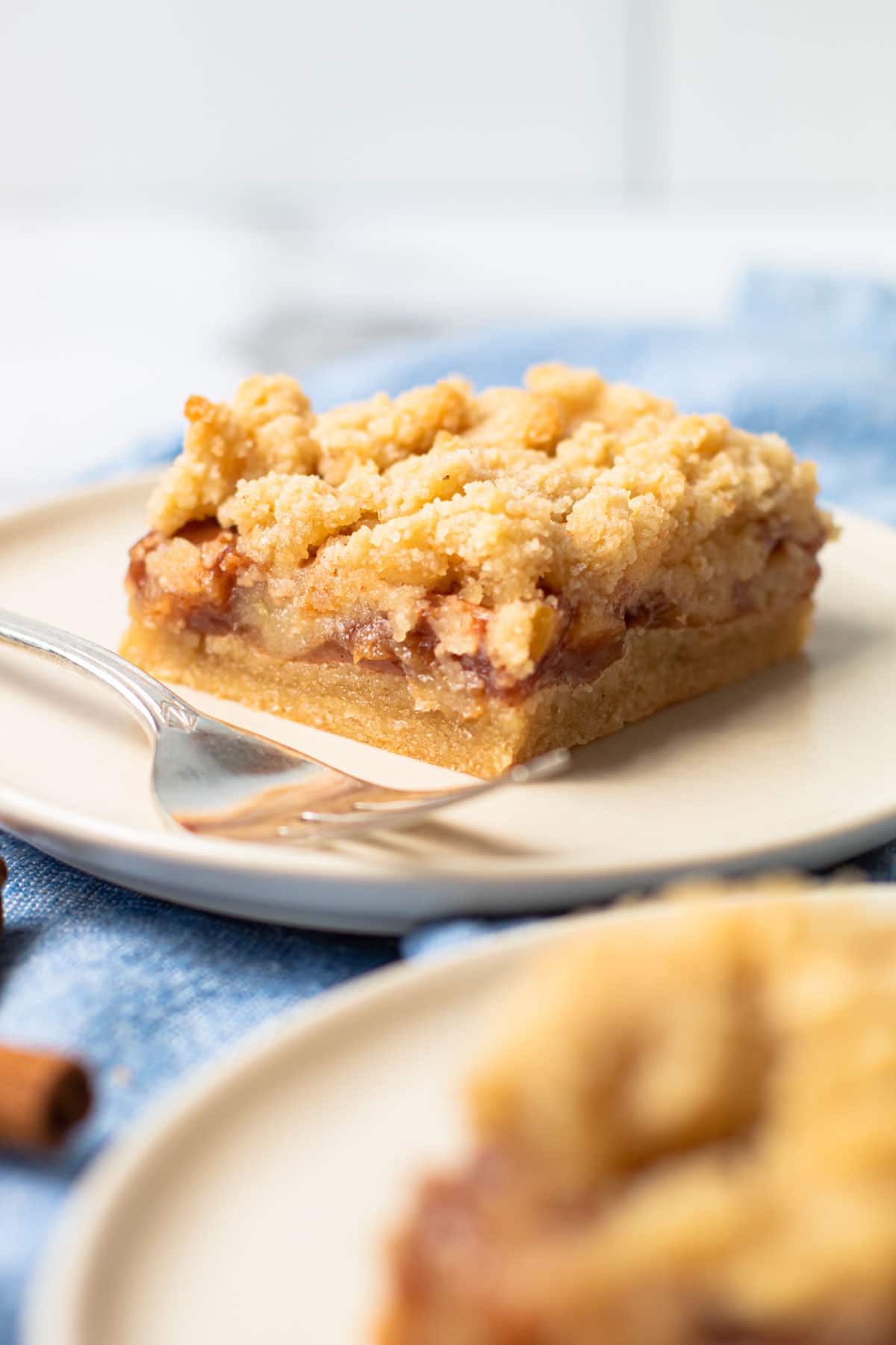 A slice of gluten free apple pie bars.