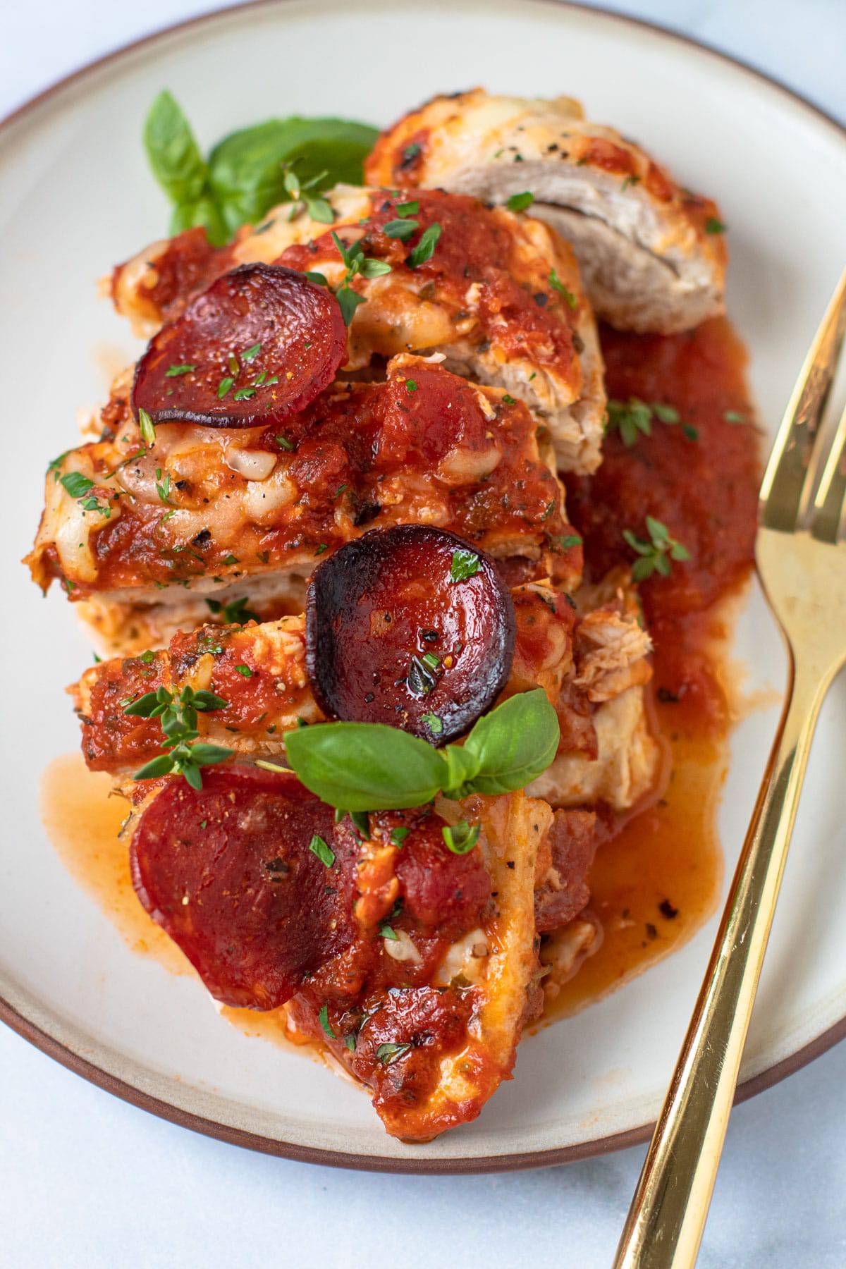 Pizza chicken on a plate.