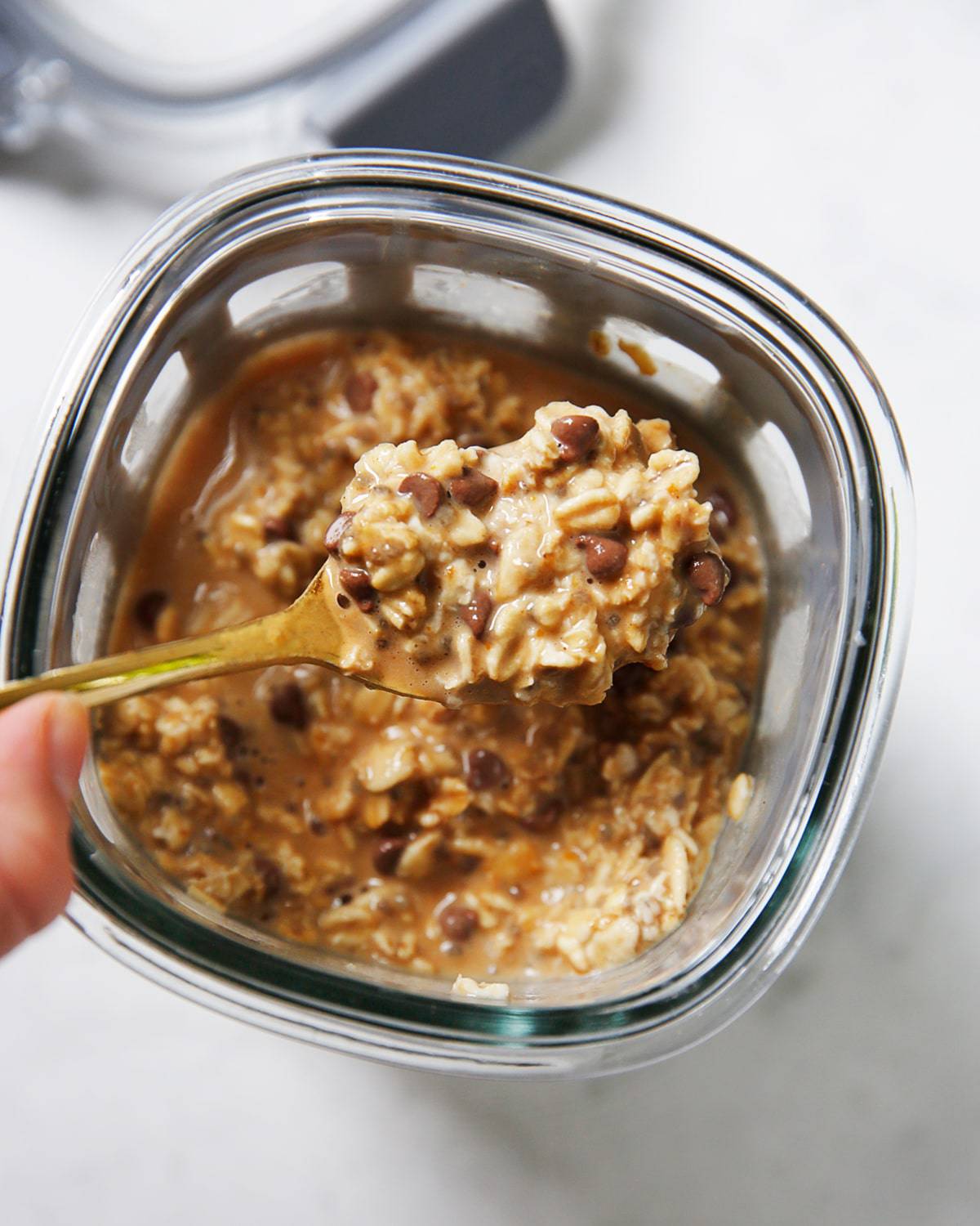 Pumpkin overnight oats in a to-go container.