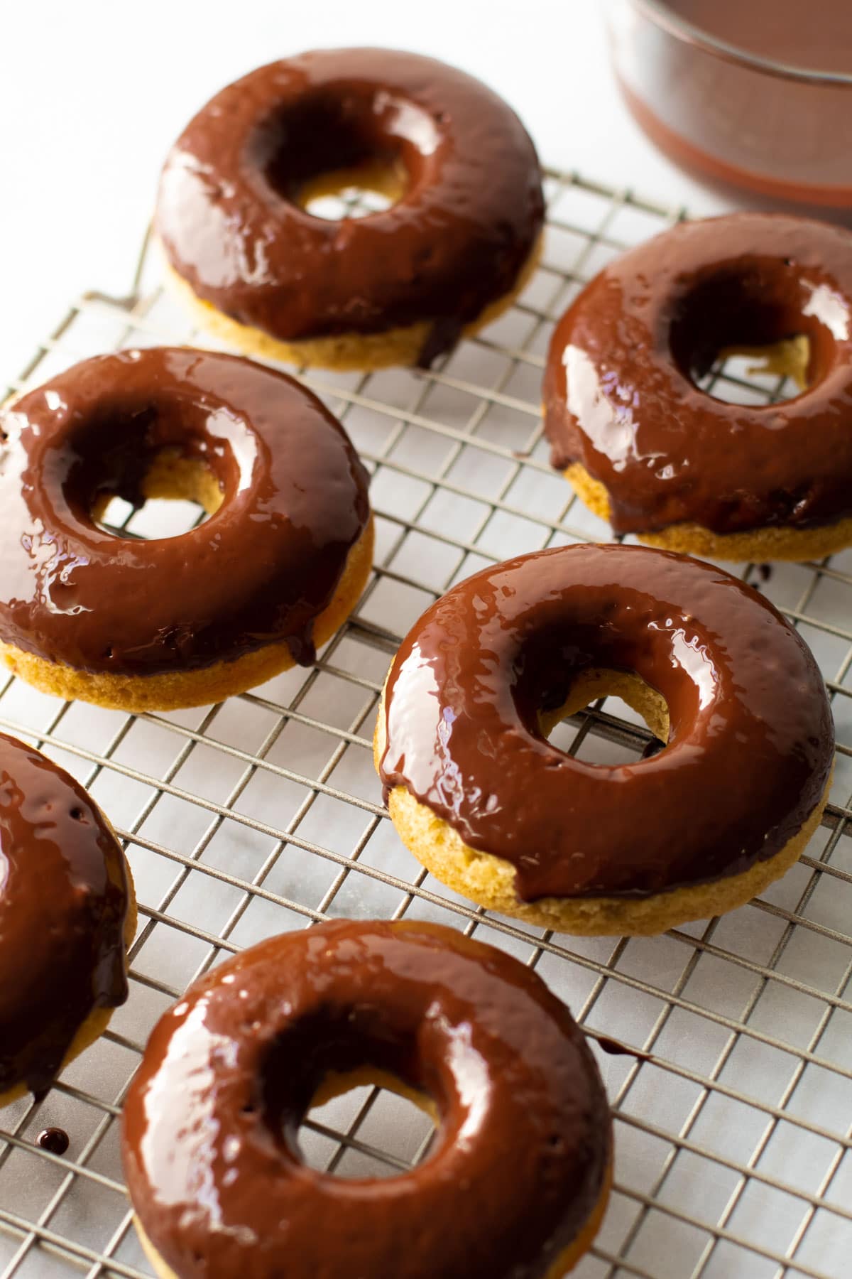 Gluten free Banana bread doughnuts with a chocolate glaze.