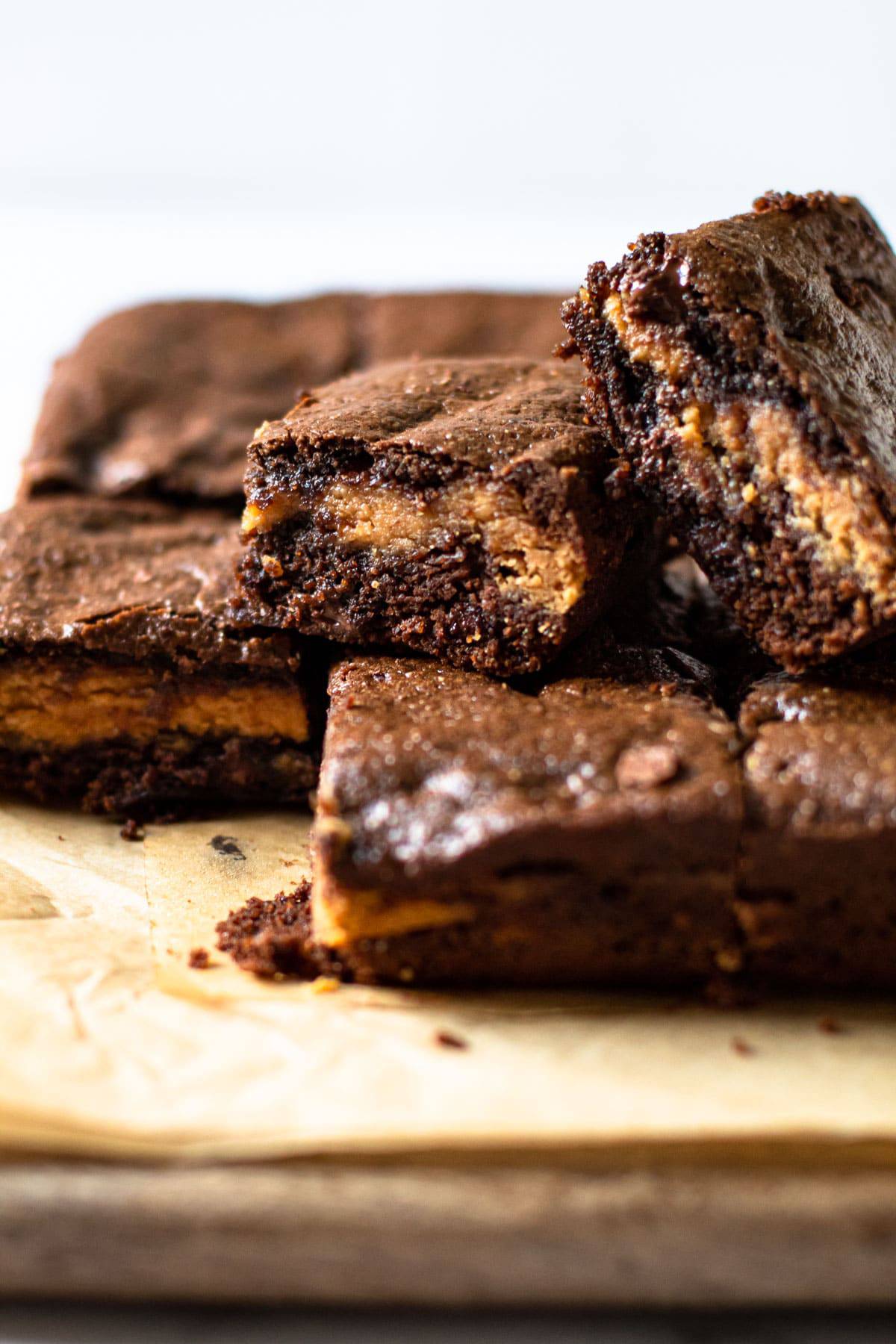 A stack of gluten-free peanut butter brownies.