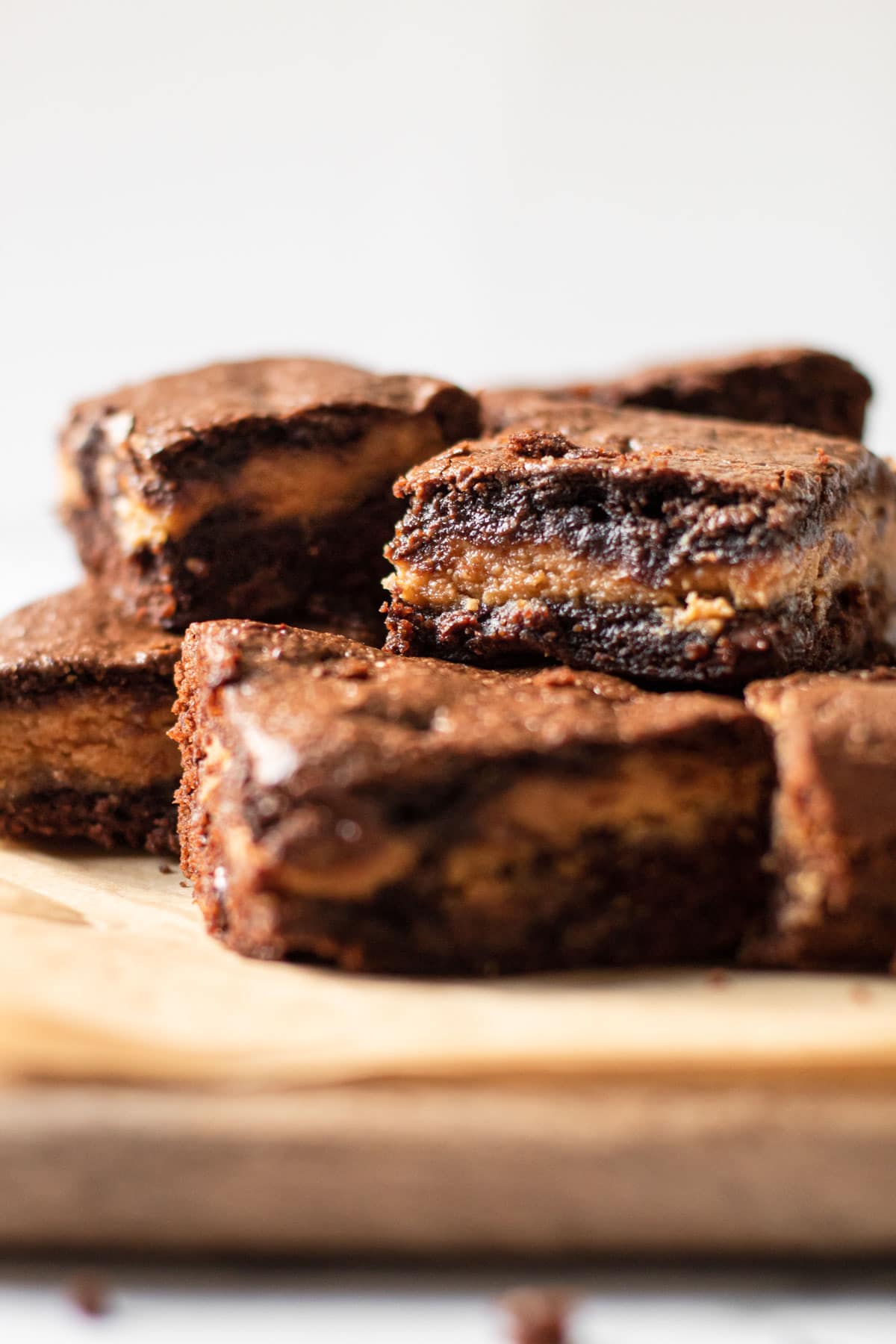 A stack of gluten-free peanut butter brownies.