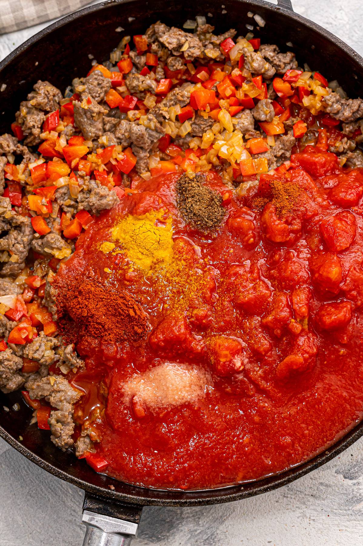 shakshuka ingredients in a pan overhead.