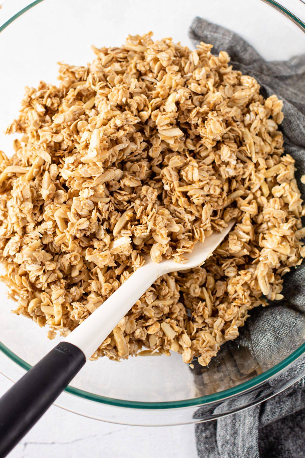 Mixing up the ingredients for birthday cake granola in a bowl.