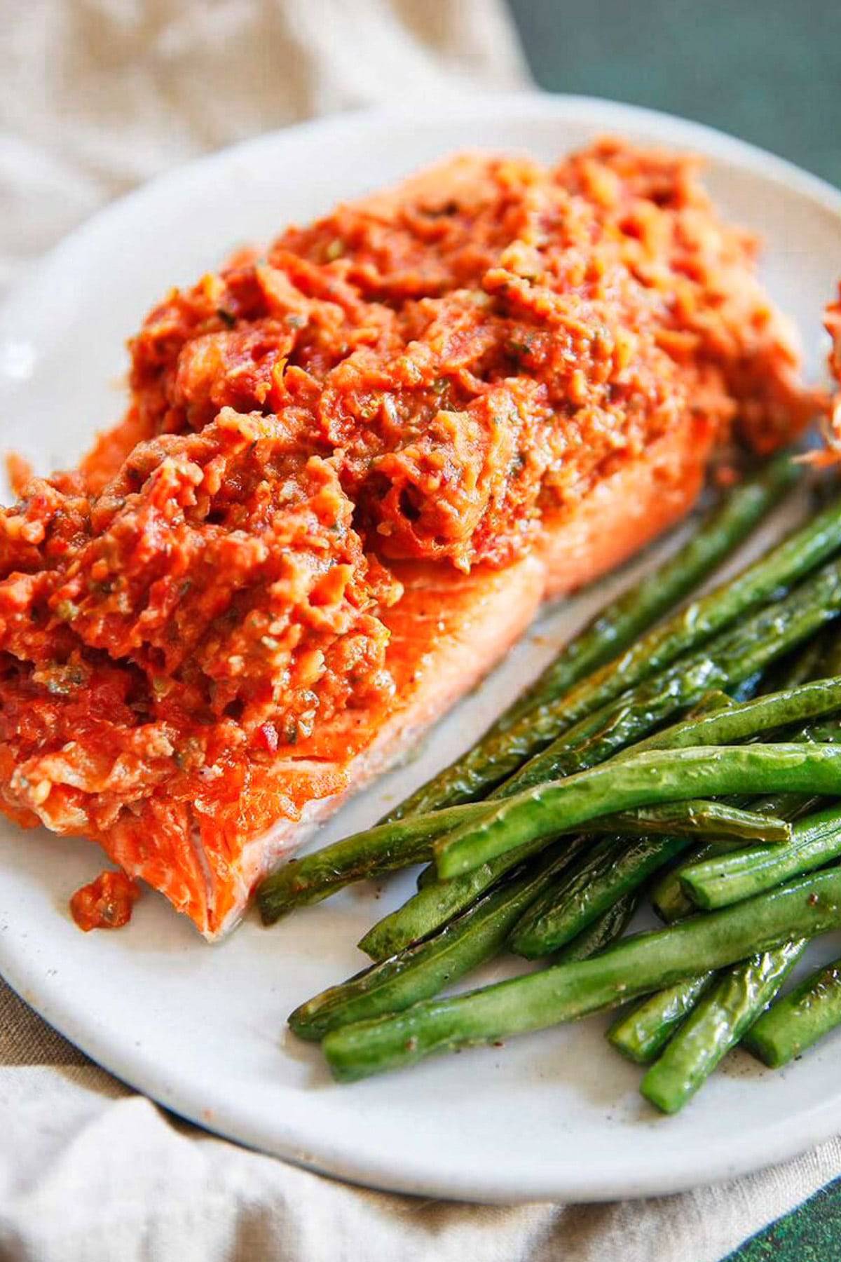 Salmon topped with puttanesca.