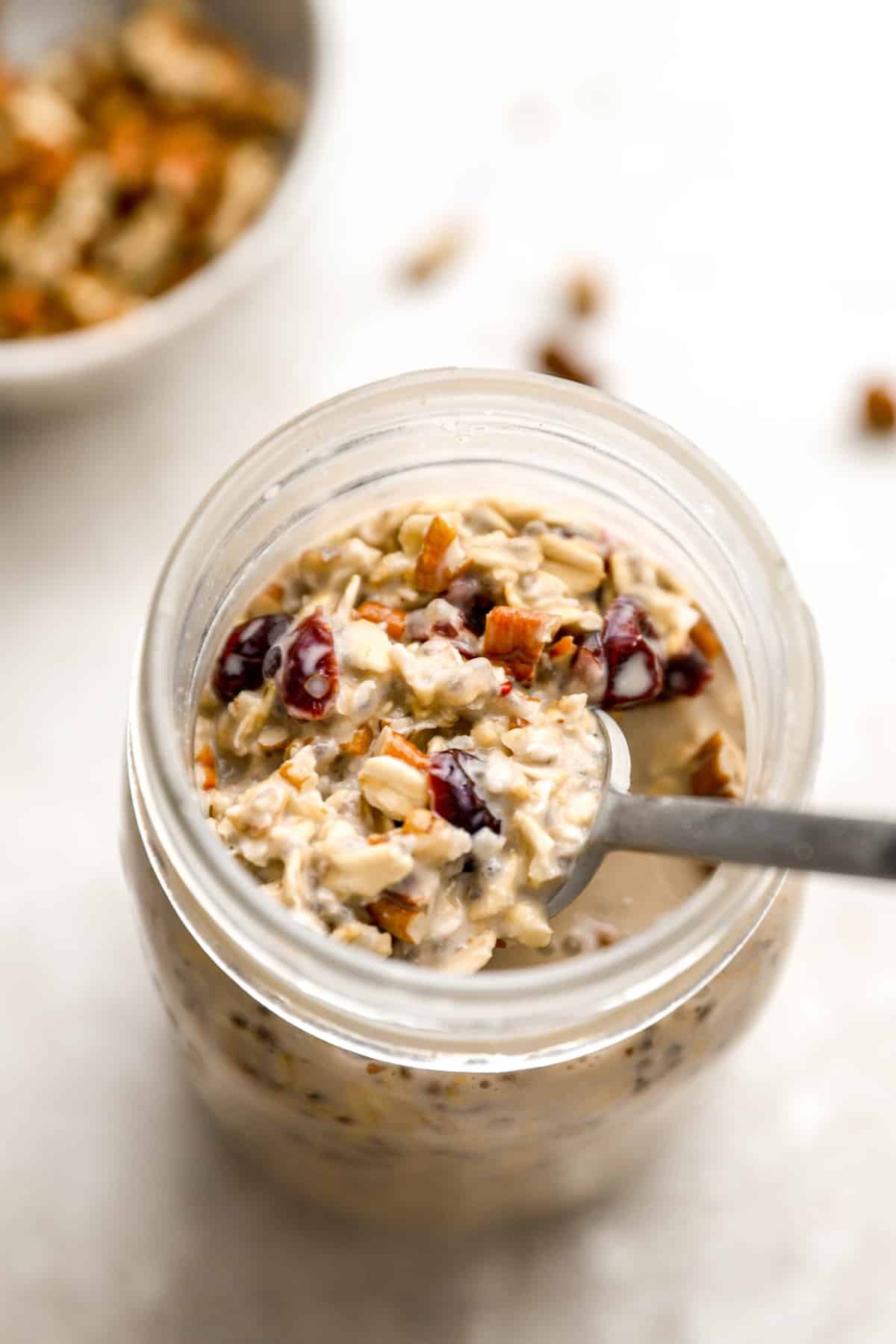 Eggnog overnight oats in a jar after sitting in the fridge