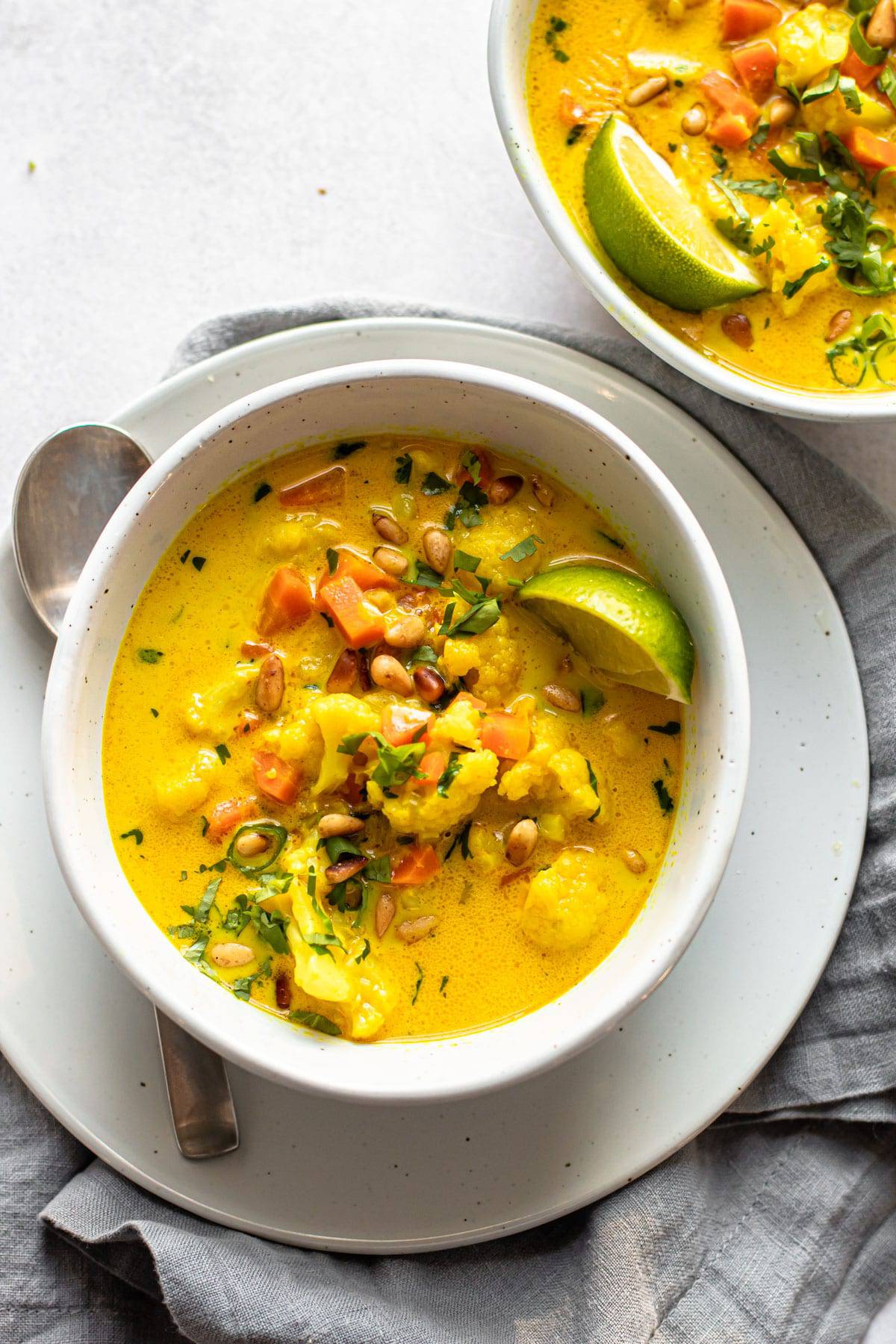 Two bowls of cauliflower soup.